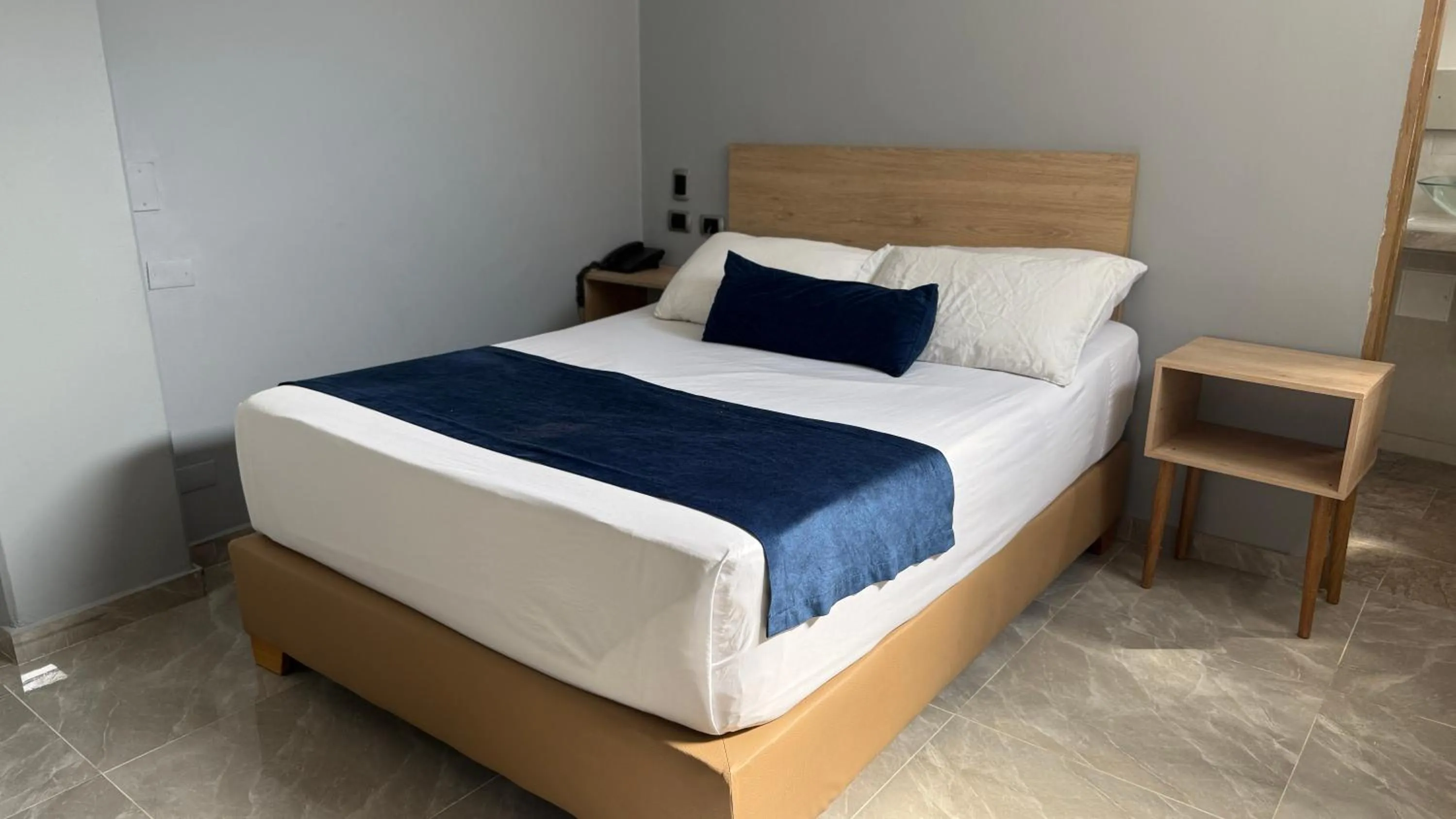 Bed in Hotel Suramericana