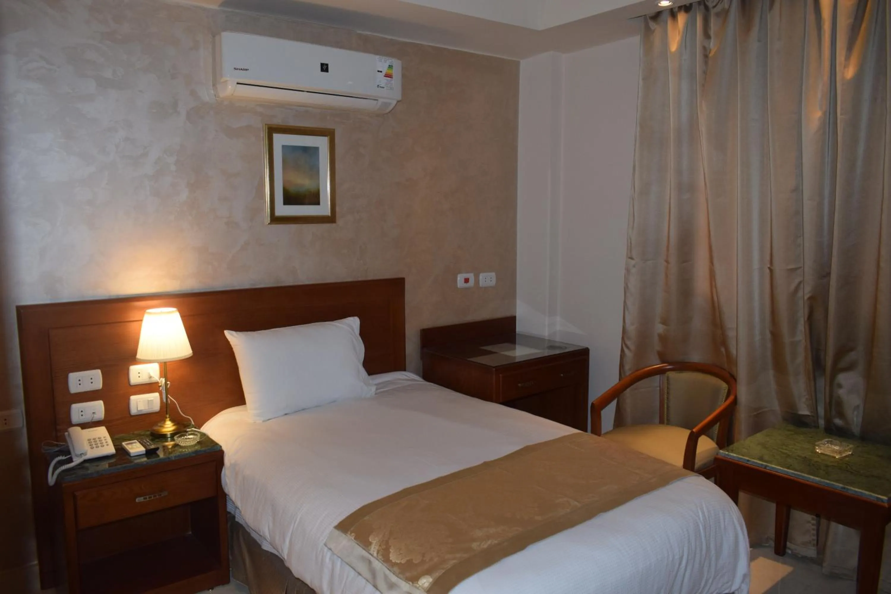 Bed in Omar El Khayam Al Minya Hotel
