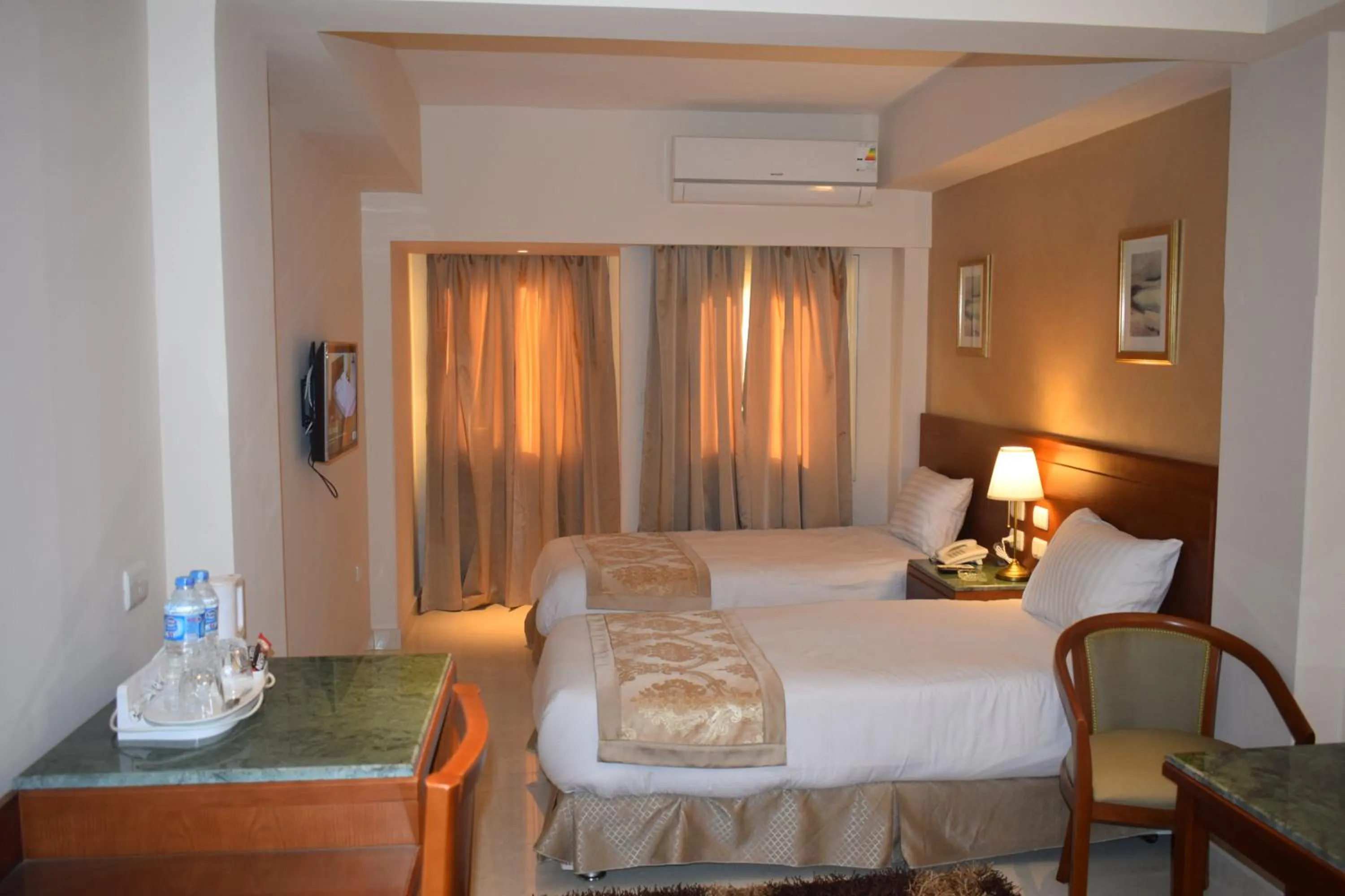 Photo of the whole room, Bed in Omar El Khayam Al Minya Hotel