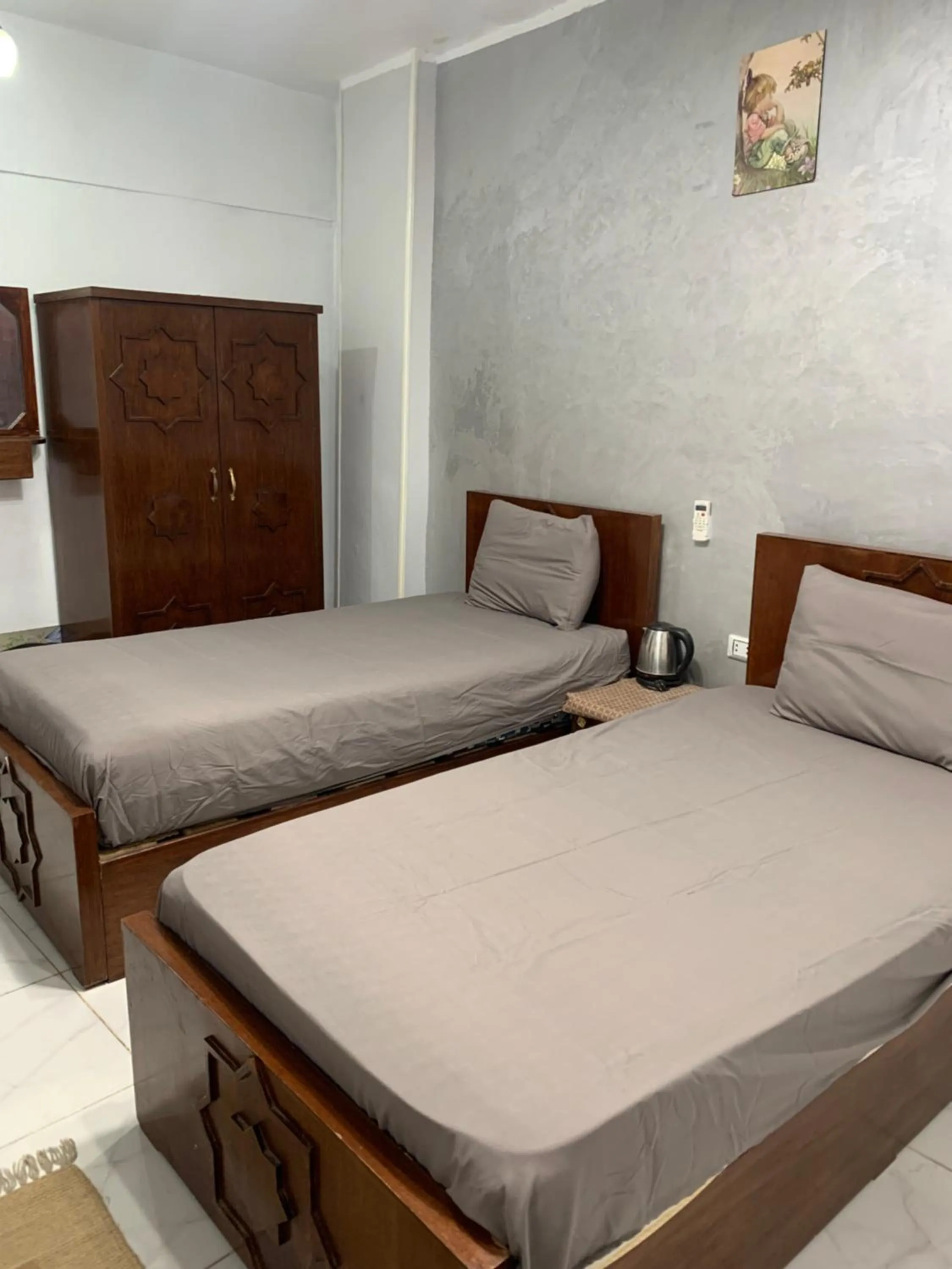 Photo of the whole room, Bed in Abo Stait - Pyramid View Homestay