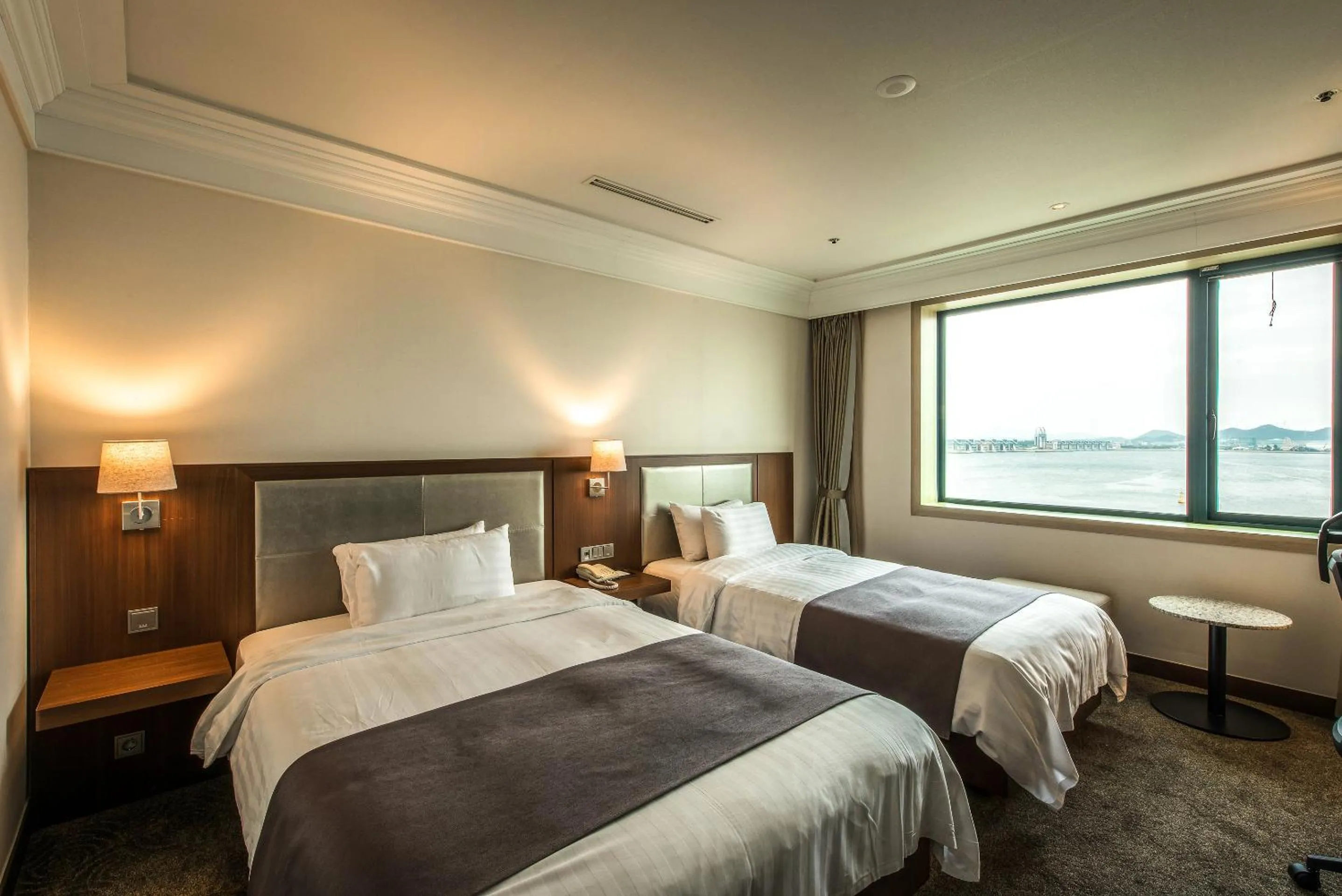 Bed in Shangria Beach Tourist Hotel