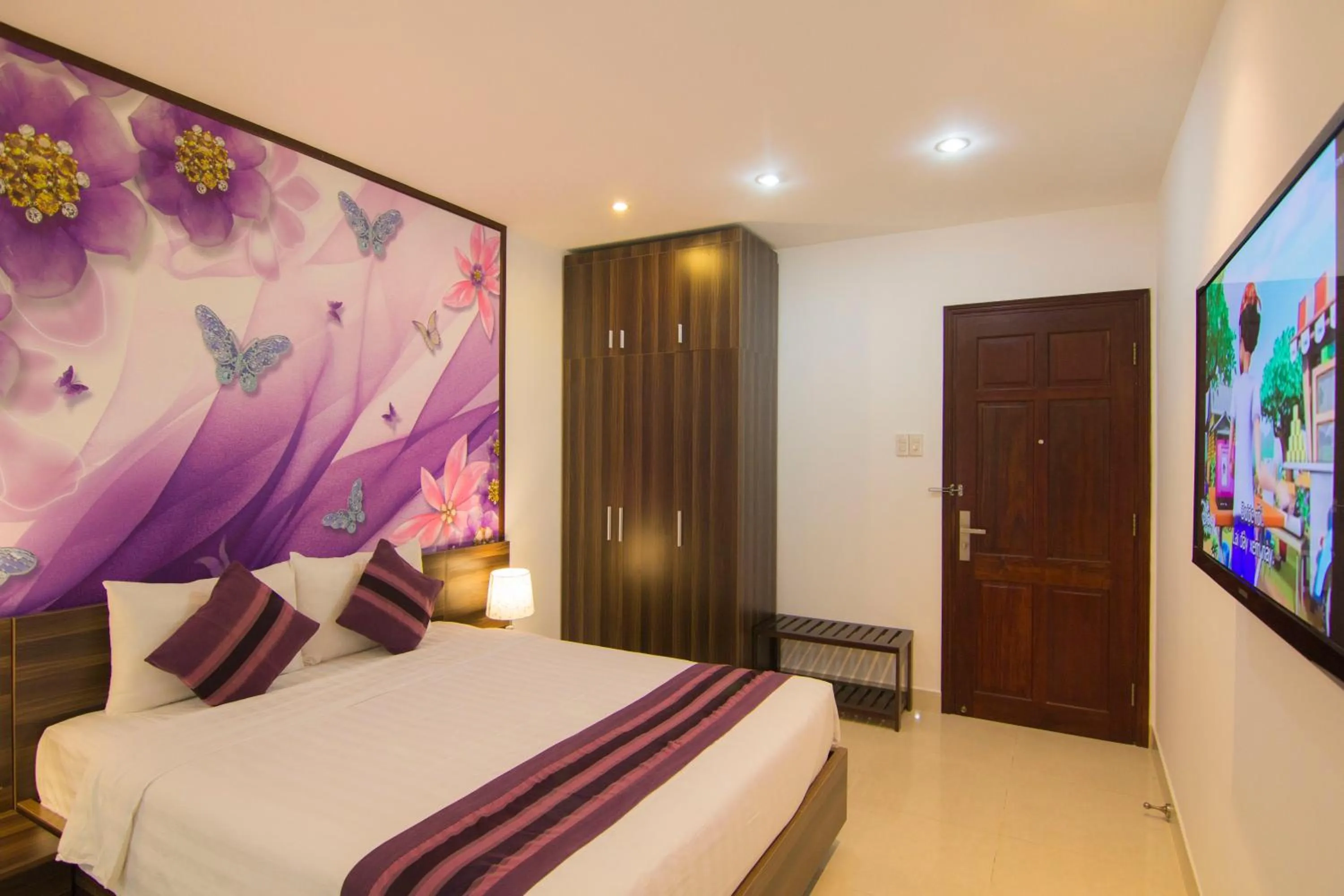 Communal lounge/ TV room, Bed in Ngoc Linh Luxury Hotel