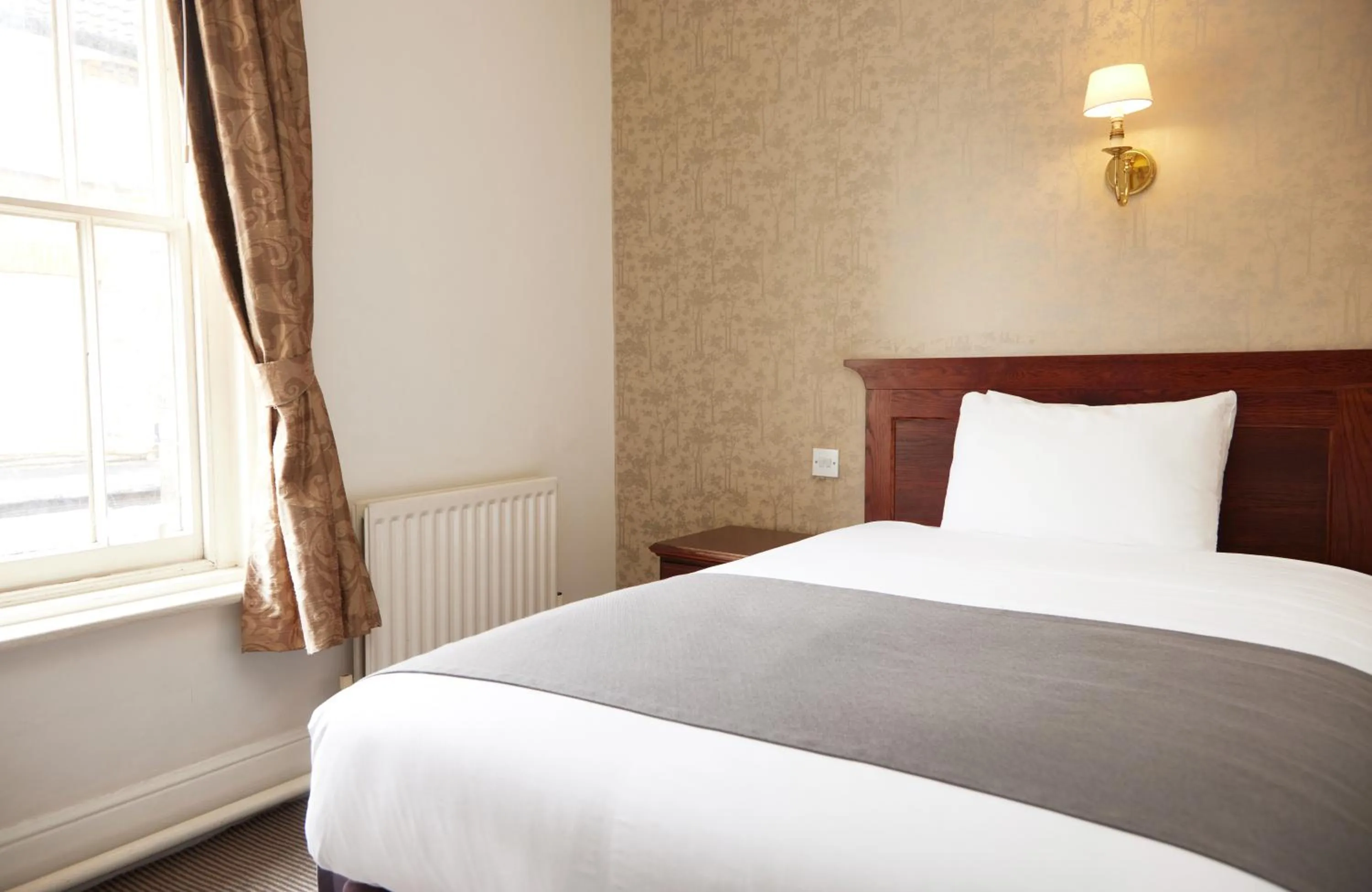 Bed in George Hotel by Greene King Inns