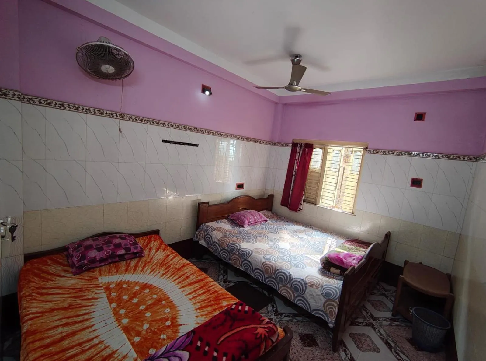 Bed in Jagannath Guest House