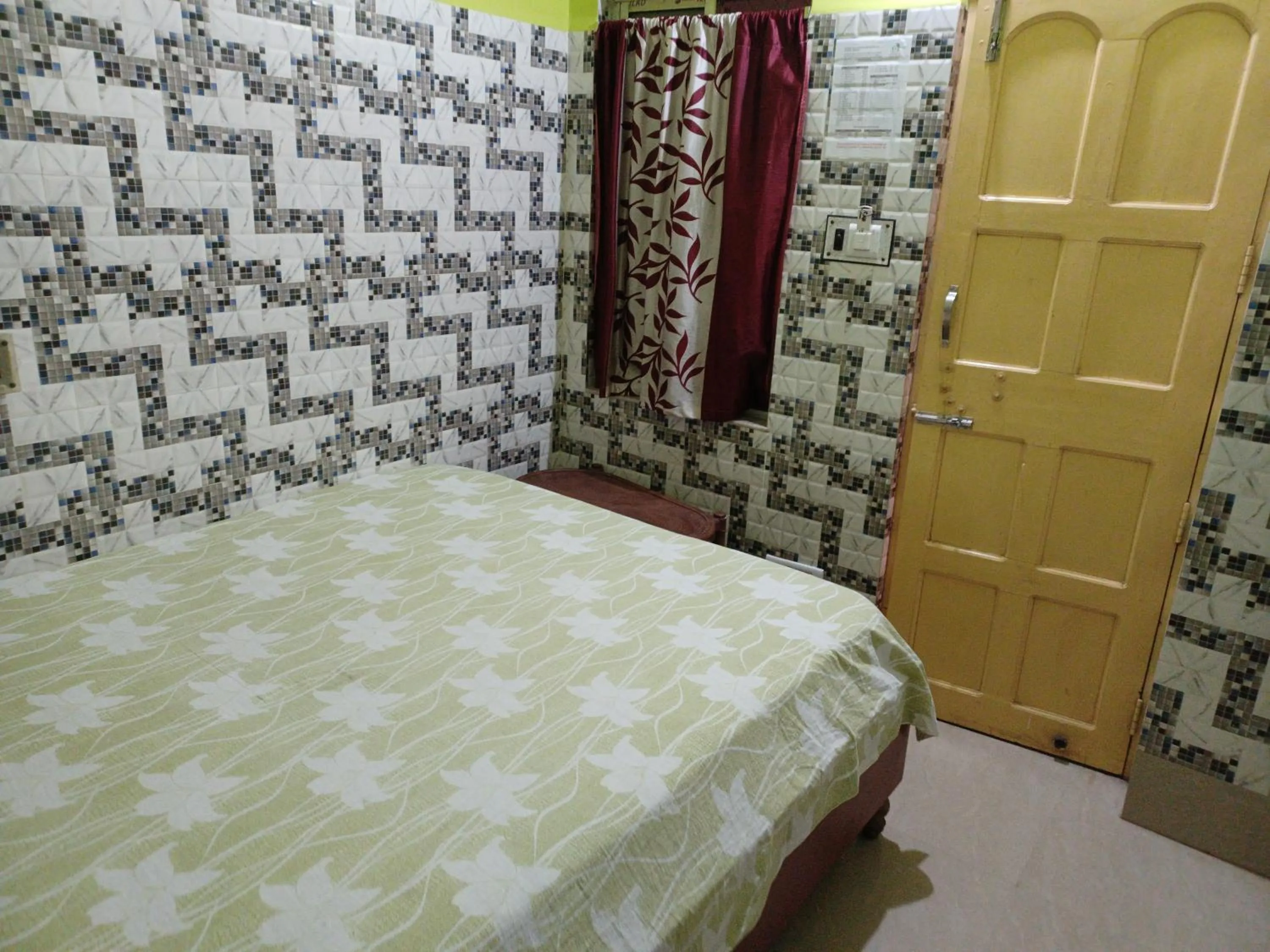 Bed in Jagannath Guest House