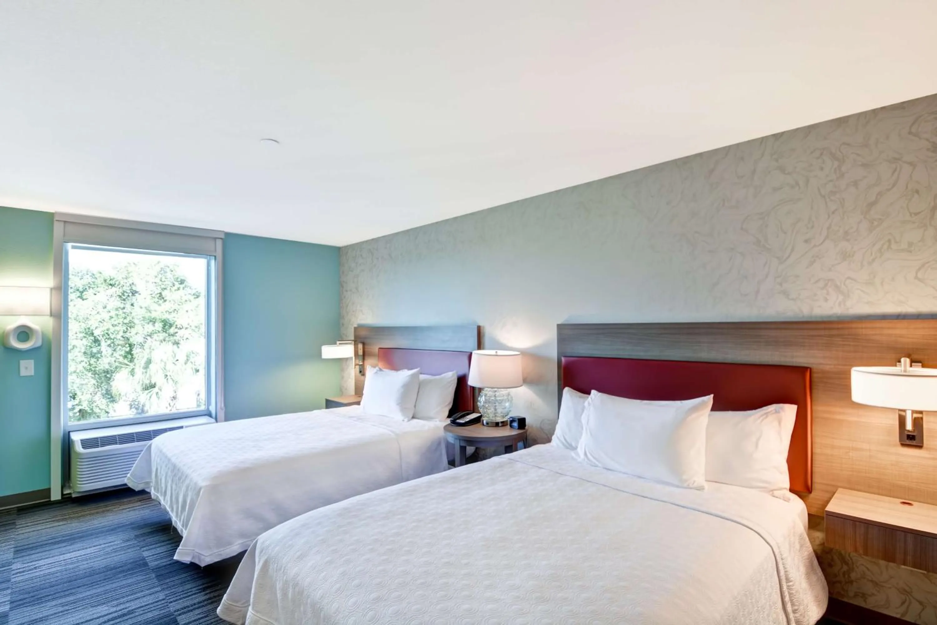 Bed in Home2 Suites By Hilton Tampa USF Near Busch Gardens