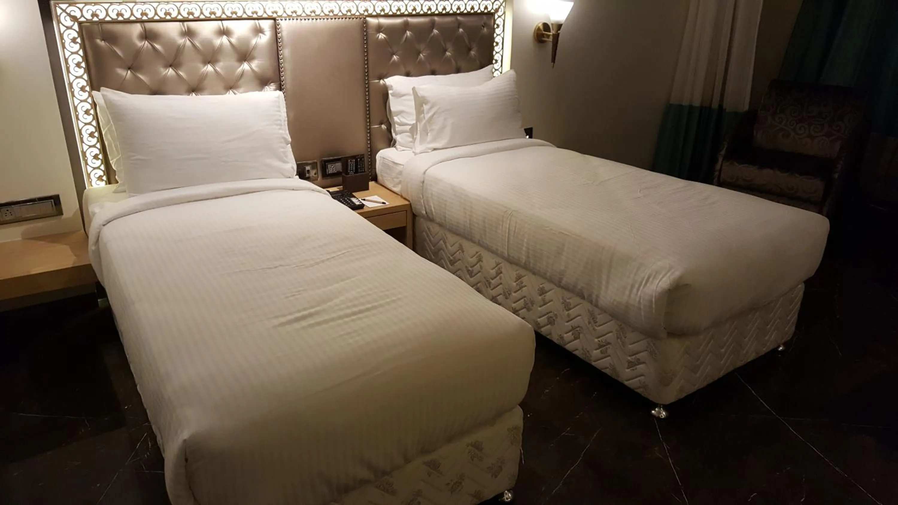 Bed in Hotel Peninsula Redpine