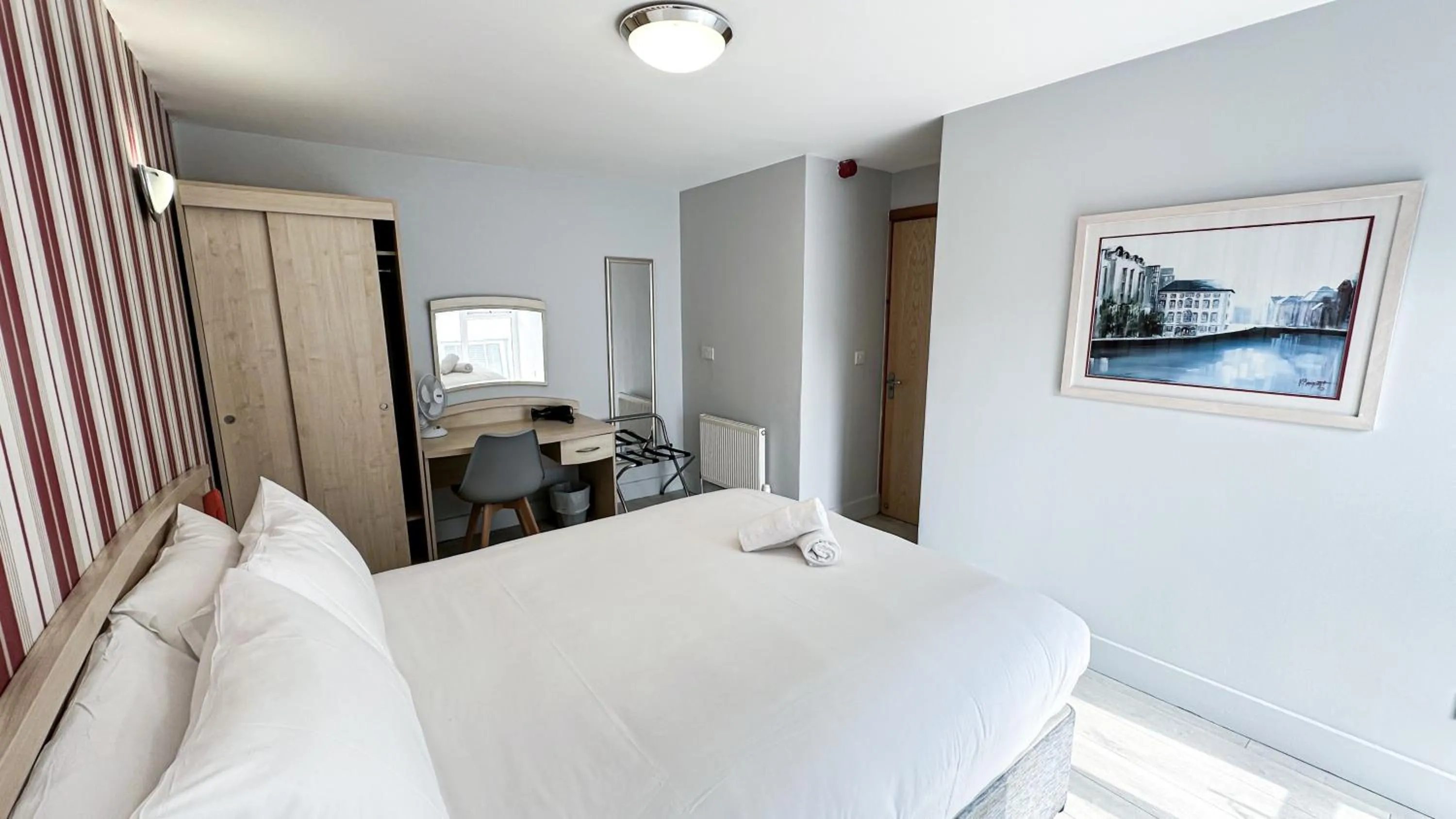 Bed in Bella Vista Hotel & Self Catering Suites