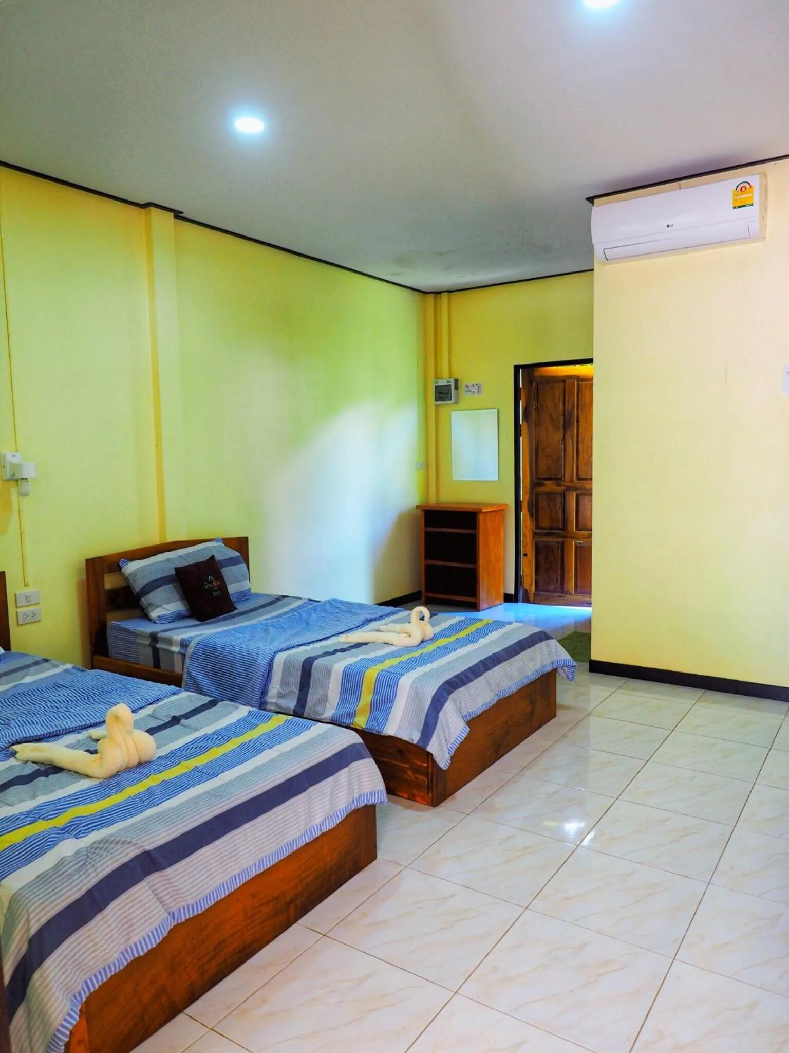 Bed in Baansuan Resort