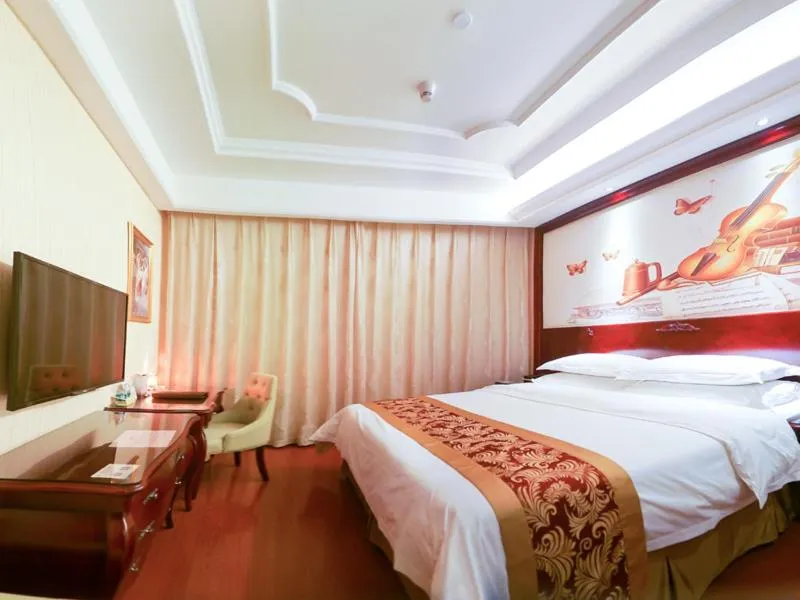 Bed in Vienna International Hotel Maoming Xinyi Xinshang Road