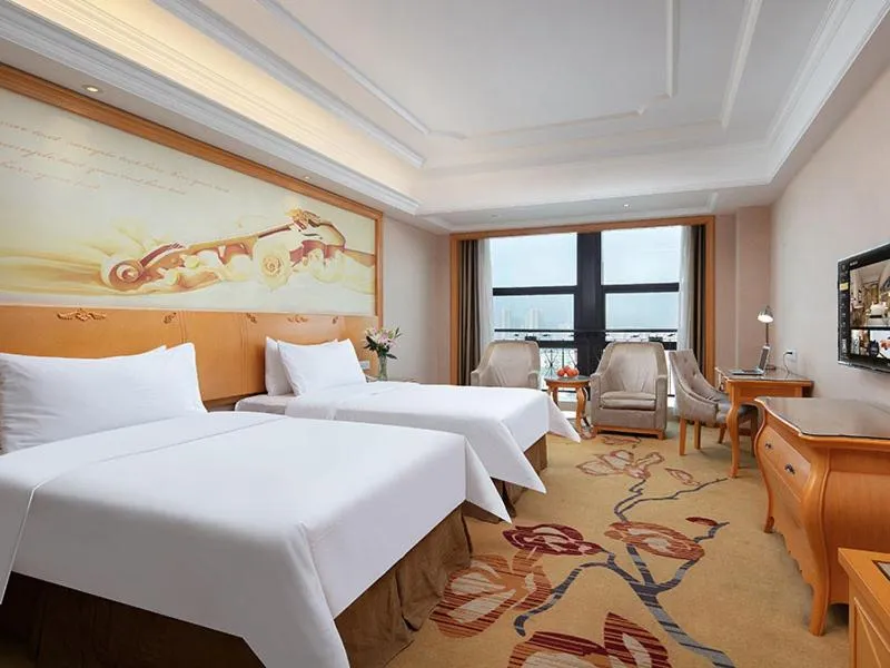 Bed in Vienna International Hotel Jiujiang Shili Street