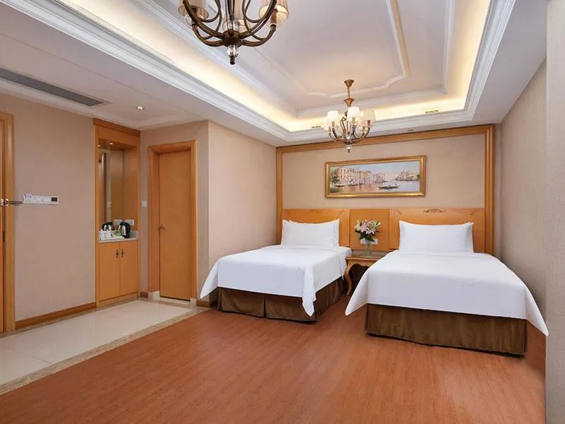Bed in Vienna International Hotel Jiujiang Shili Street