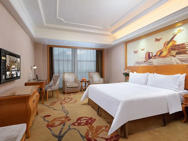 Bed in Vienna International Hotel Jiujiang Shili Street