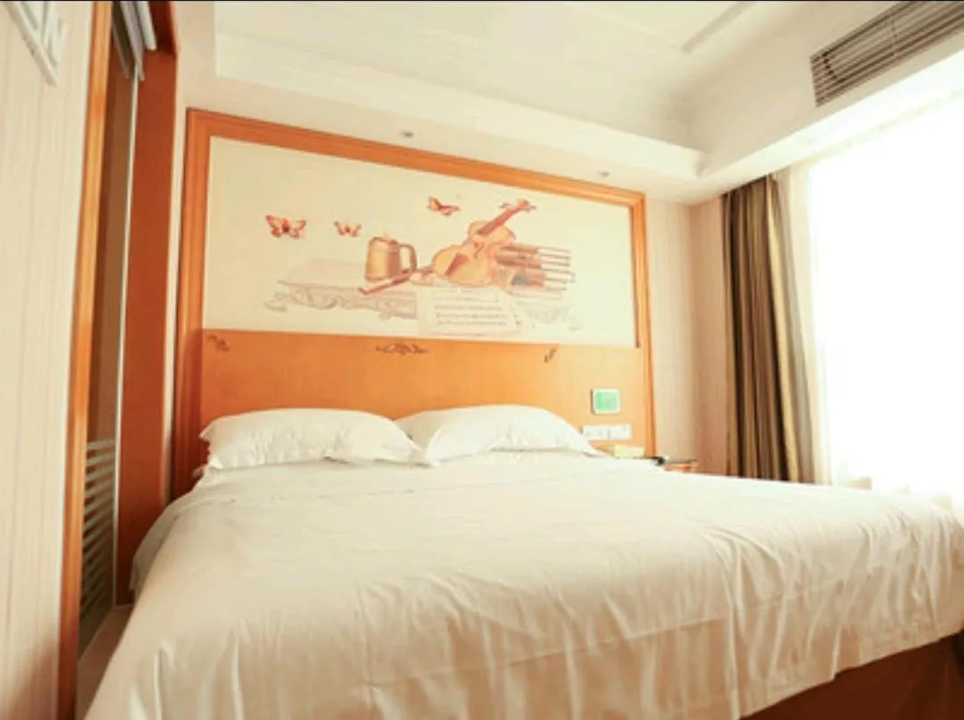 Bed in Vienna Hotel Huizhou Baiyun Road