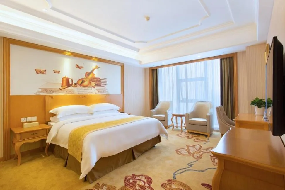 Bed in Vienna International Hotel Changsha Hongxing