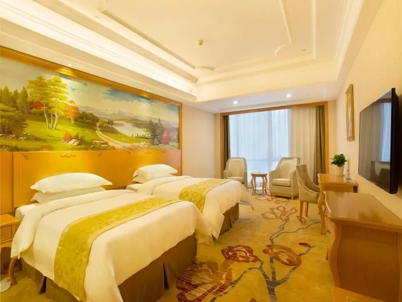 Bed in Vienna International Hotel Changsha Hongxing