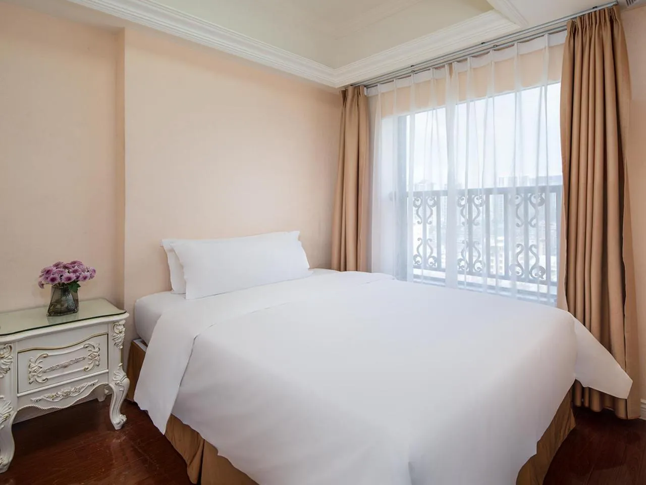 Bed in Vienna International Hotel Jieyang Yangmei Jade hotel