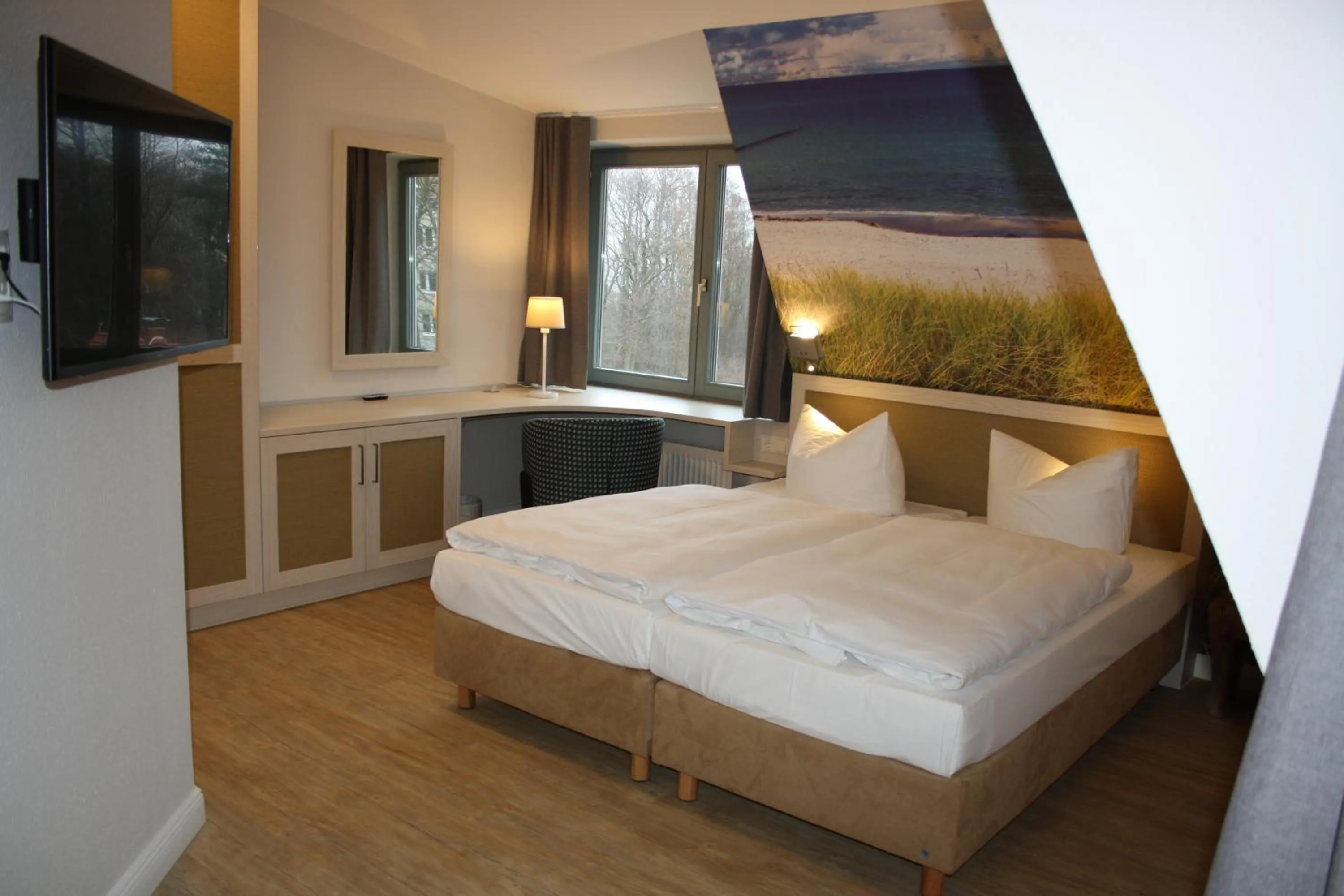 Photo of the whole room, Bed in Hotel Haus am Meer