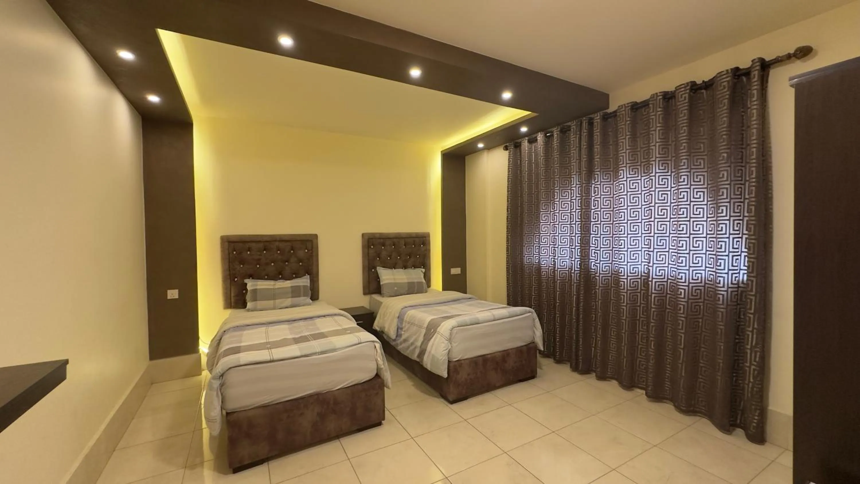 Bed in Al Riyati Hotel Apartments