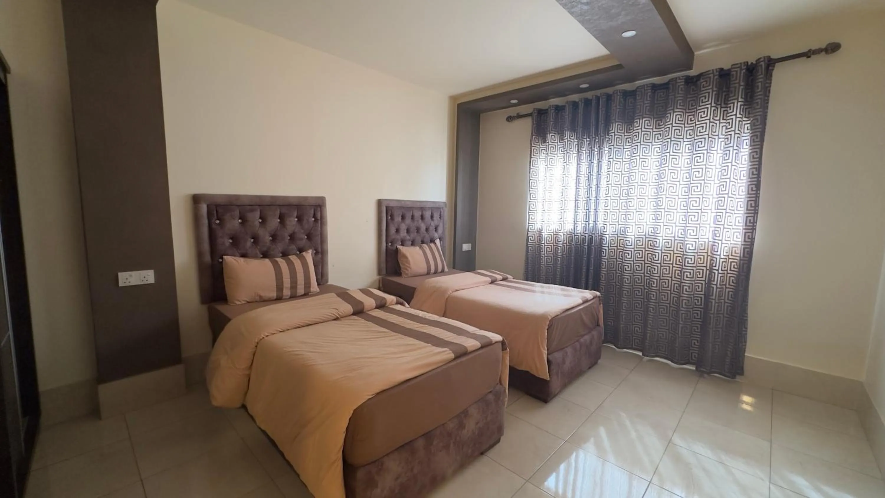 Bed in Al Riyati Hotel Apartments