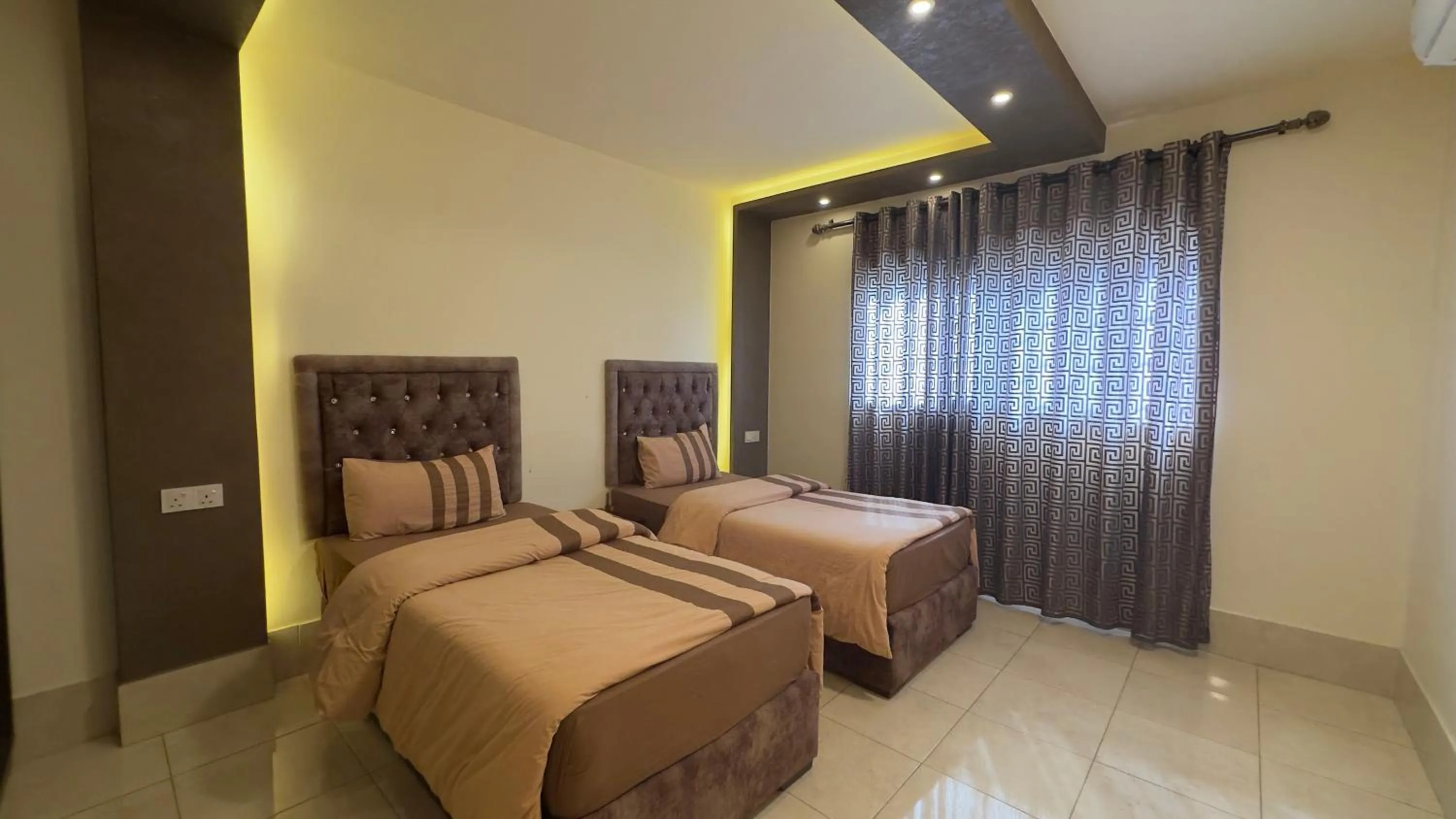 Bed in Al Riyati Hotel Apartments