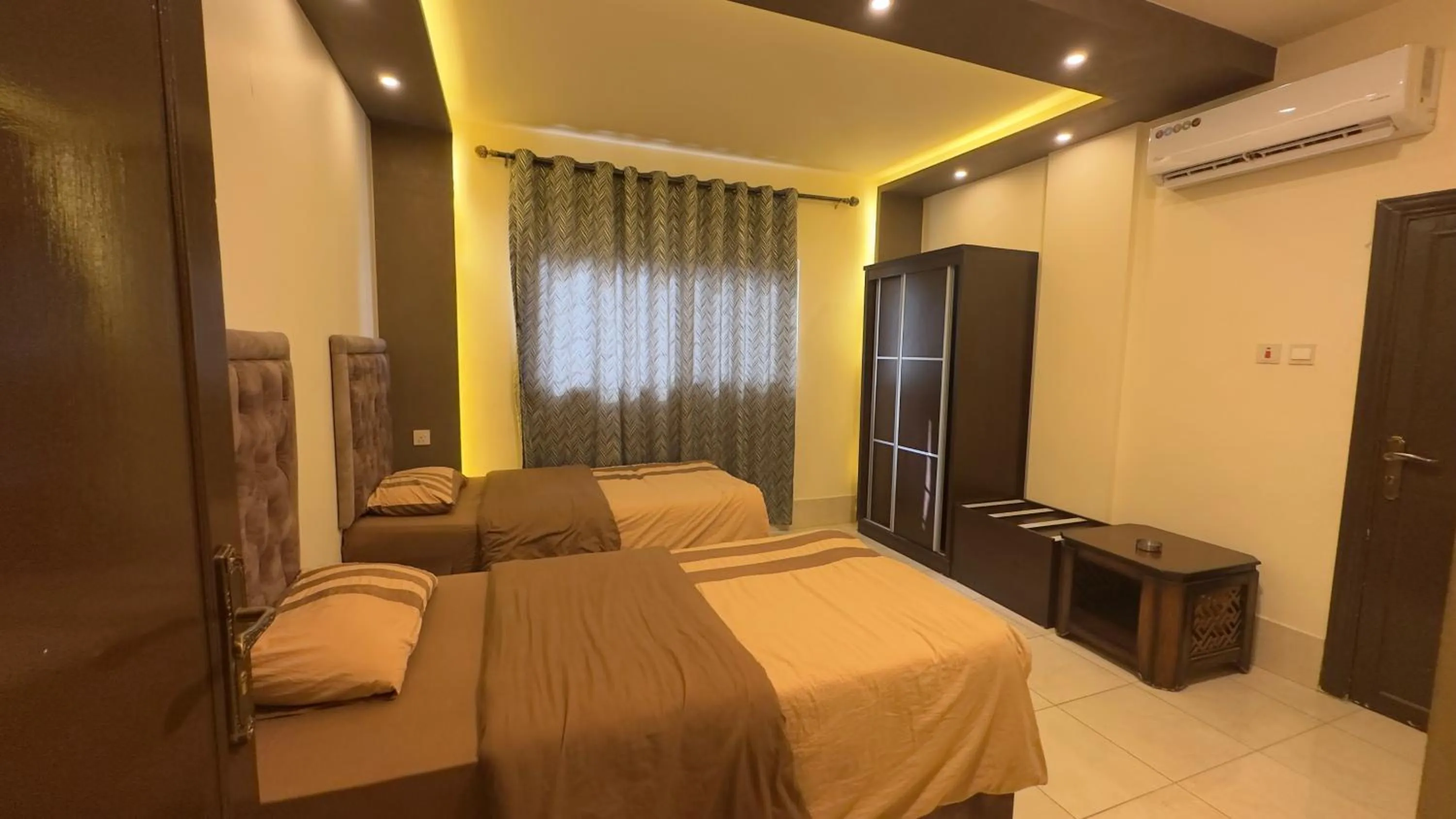 Bed in Al Riyati Hotel Apartments