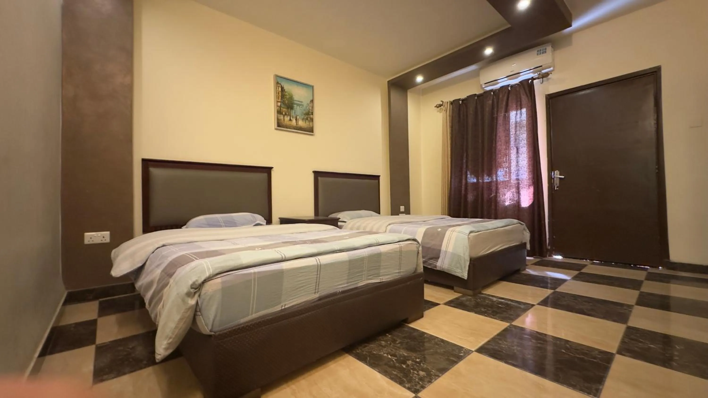 Bed in Al Riyati Hotel Apartments