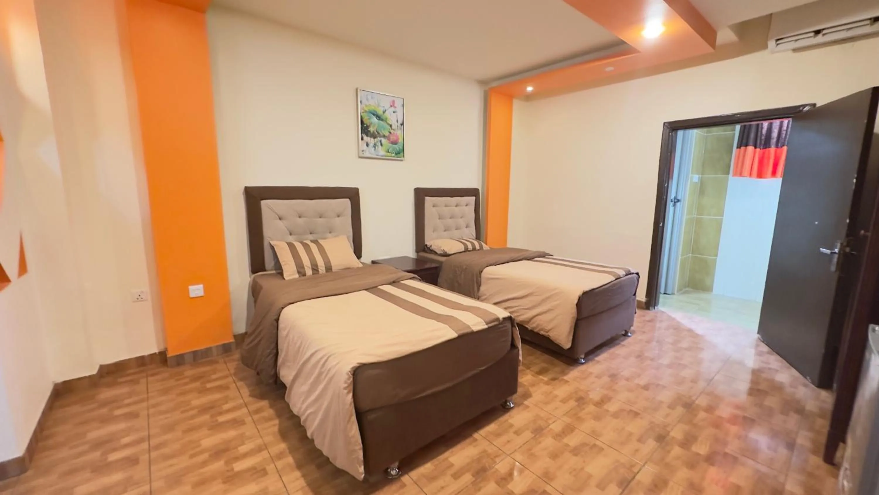 Bed in Al Riyati Hotel Apartments