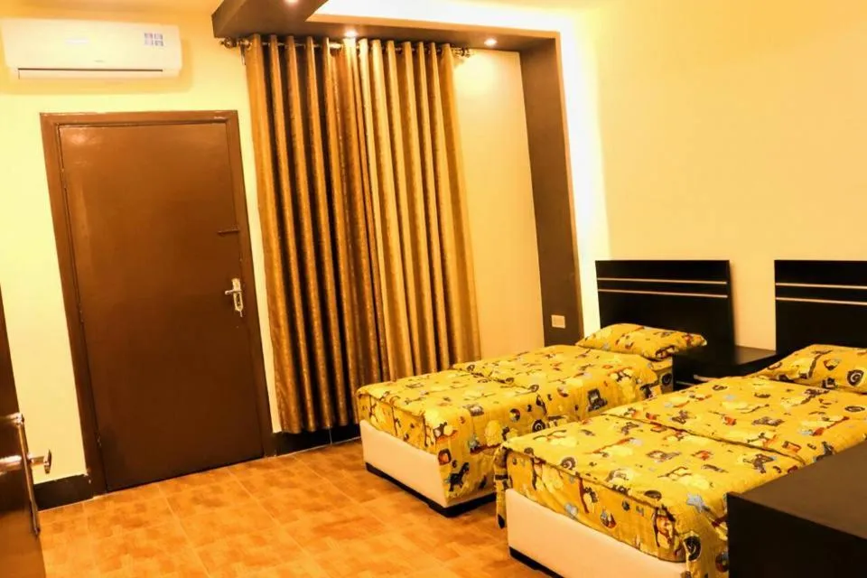 Bed in Al Riyati Hotel Apartments