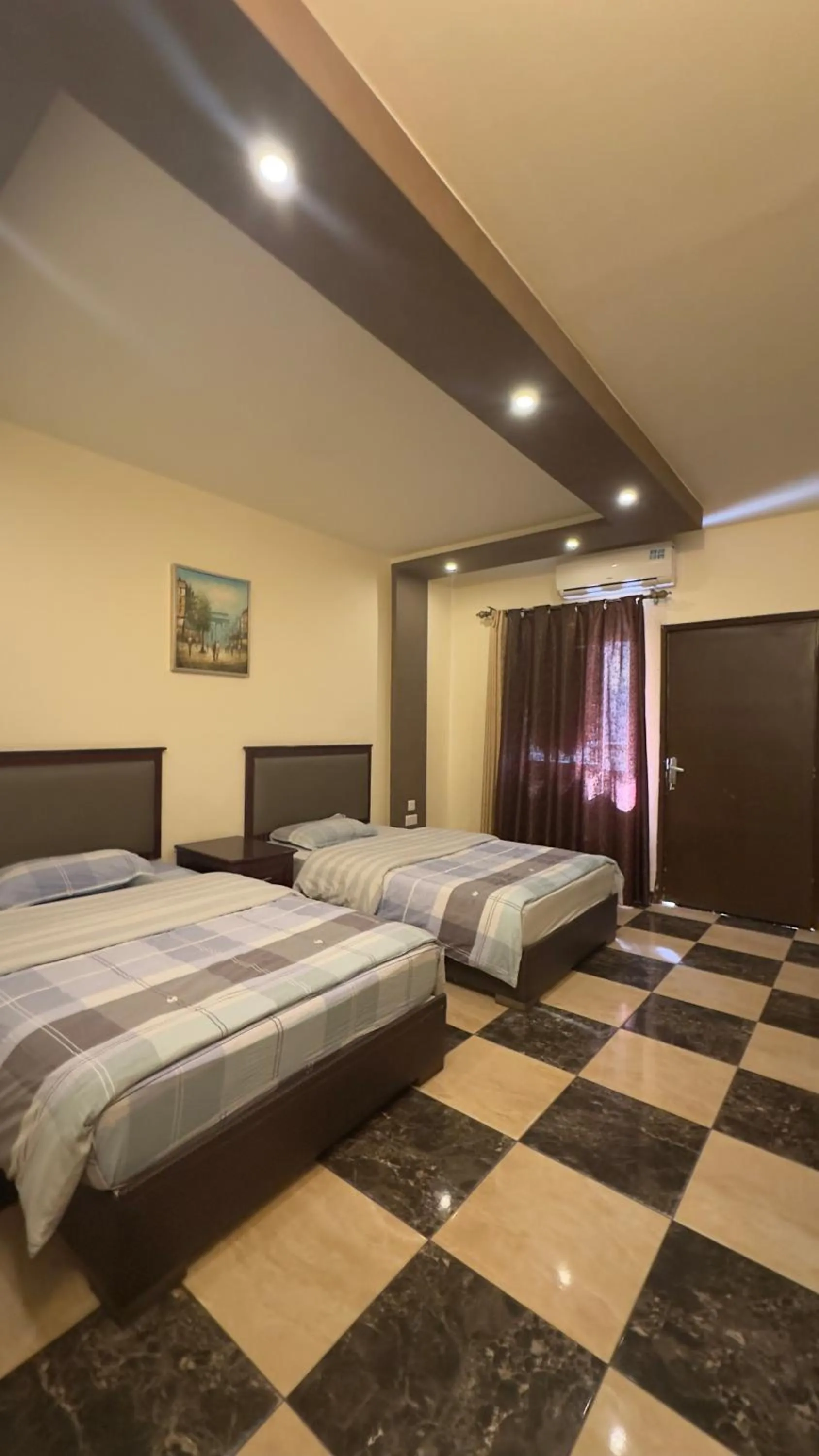 Bed in Al Riyati Hotel Apartments
