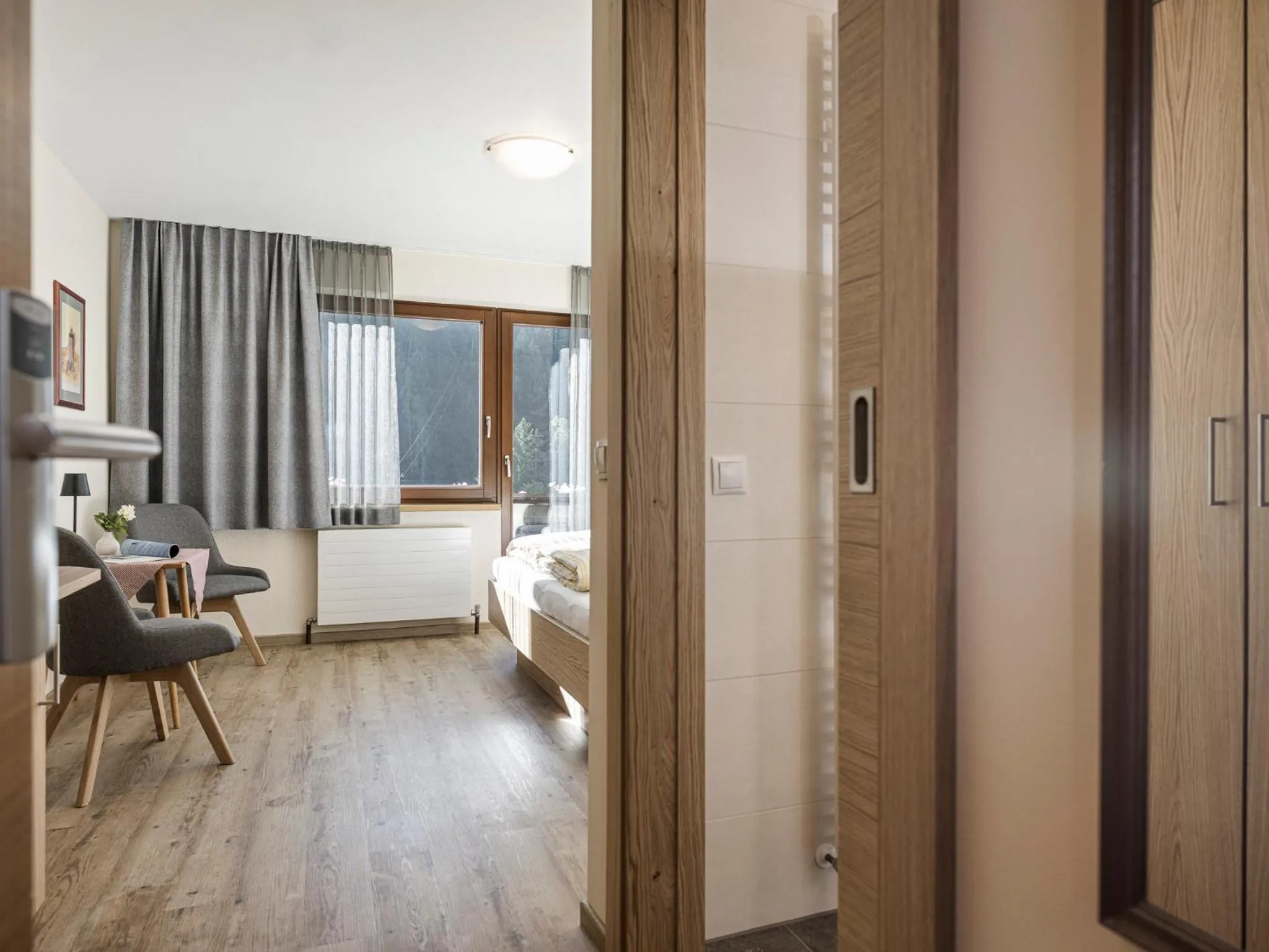 Bed in Appartementhaus Sennhüttn