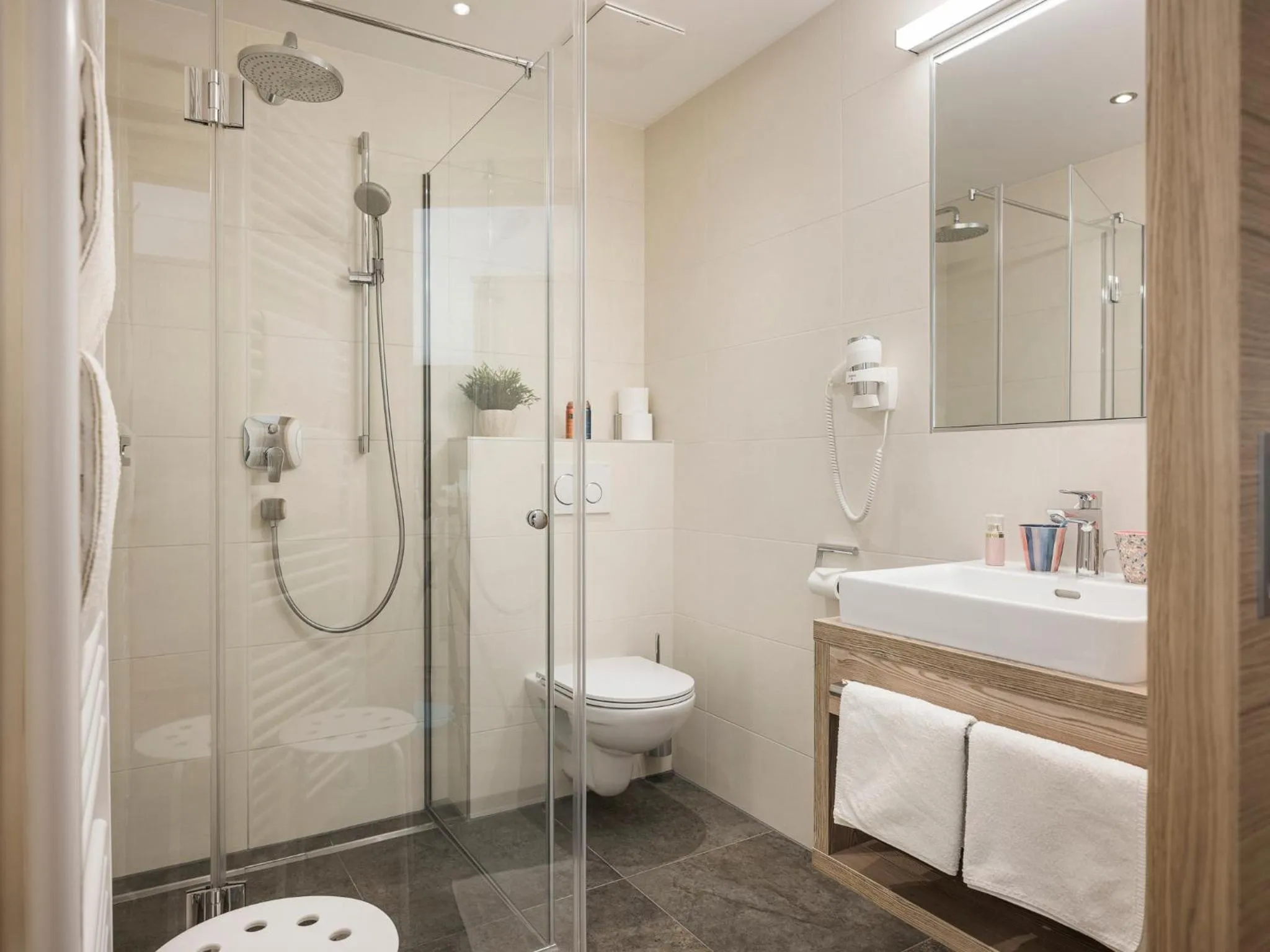 Shower in Appartementhaus Sennhüttn