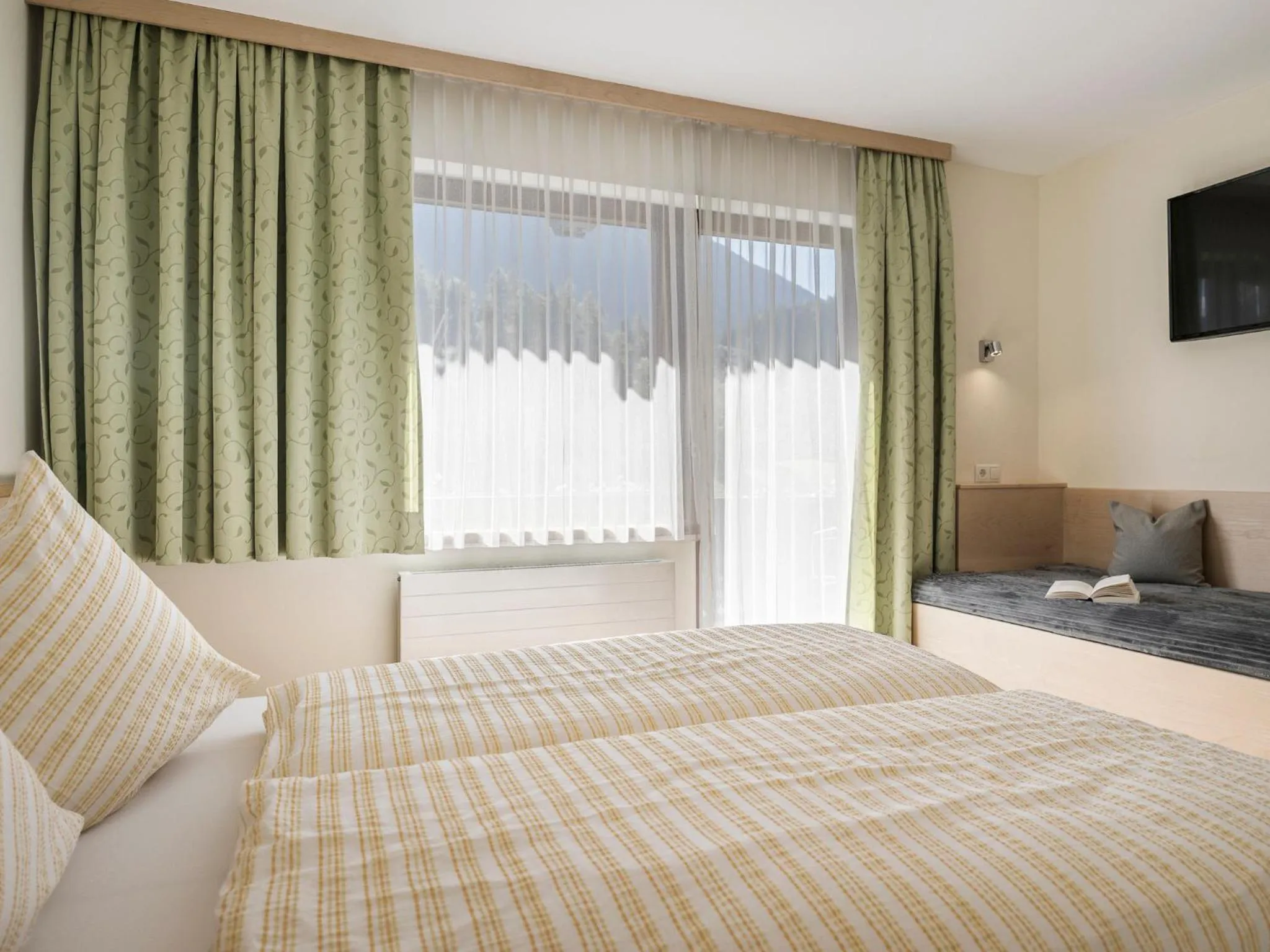 Bed in Appartementhaus Sennhüttn