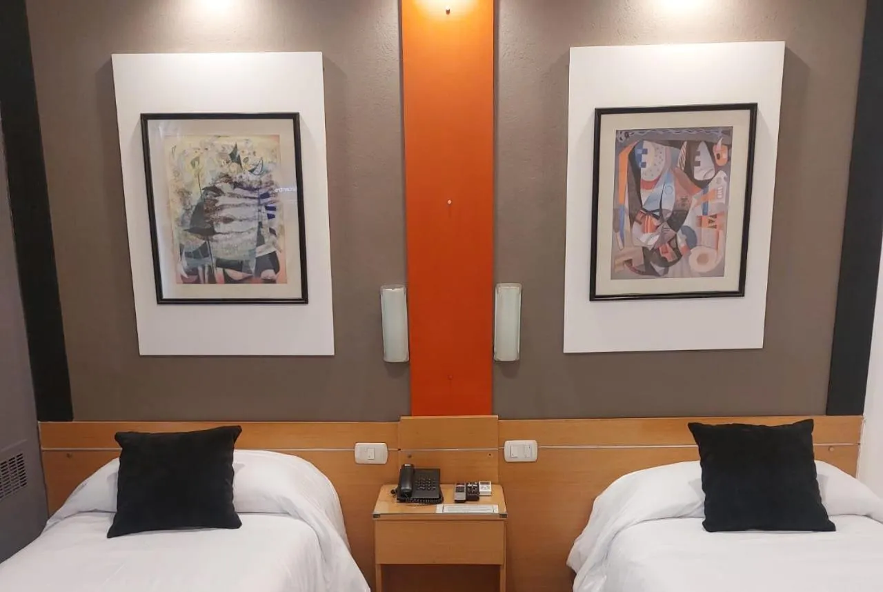 Bed in Sarmiento Palace Hotel