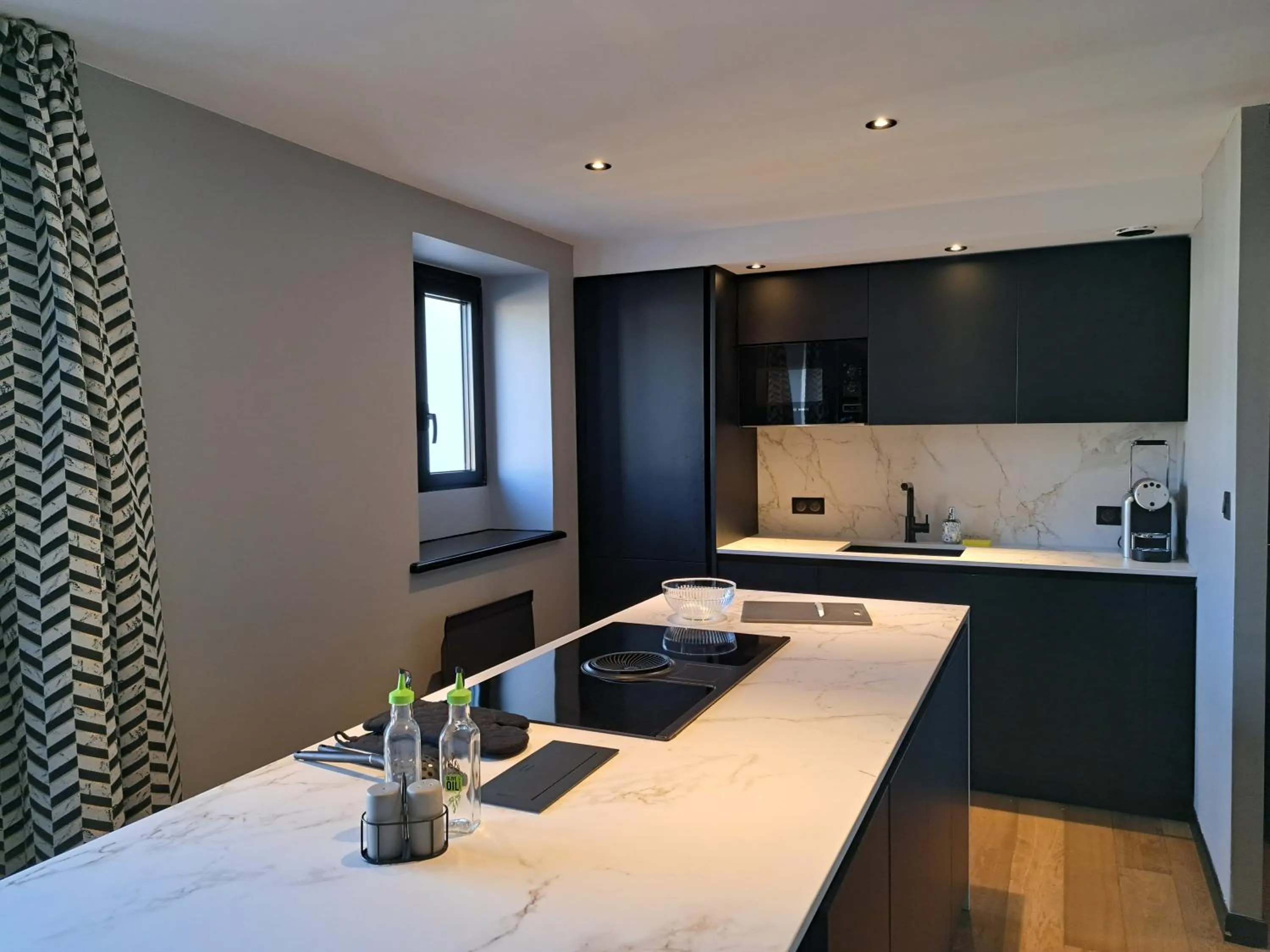 Kitchen or kitchenette in Brit Hotel Les Voyageurs