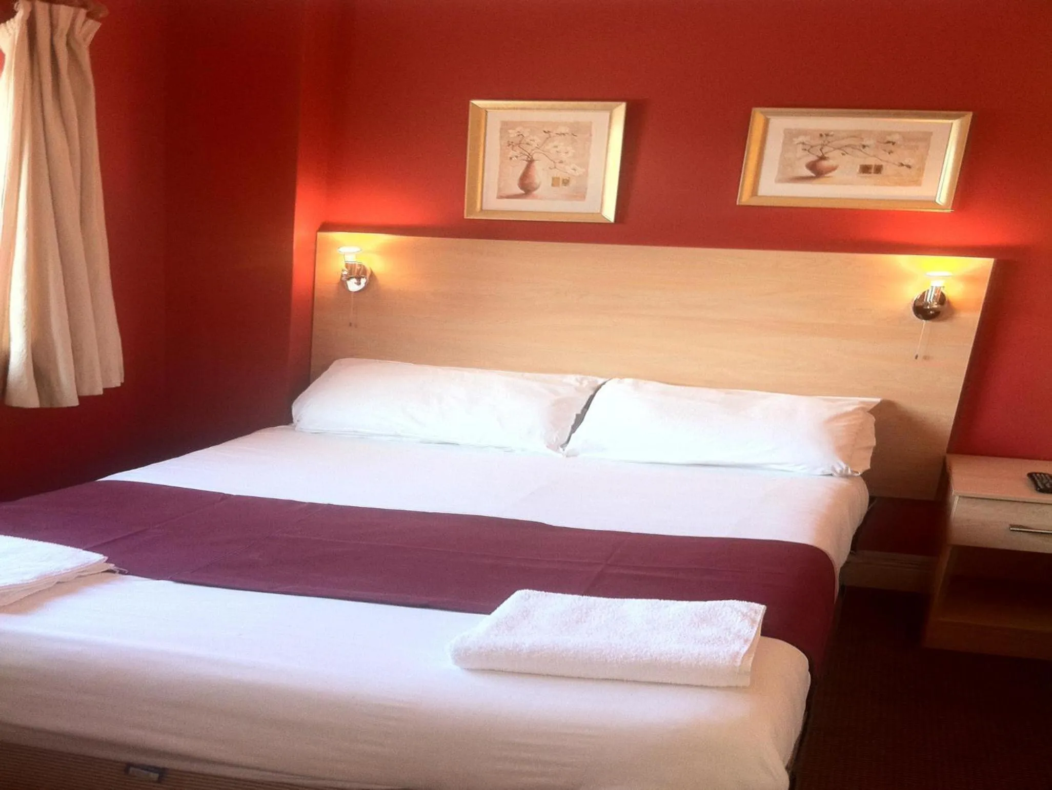 Bed in City Inn Express Hotel