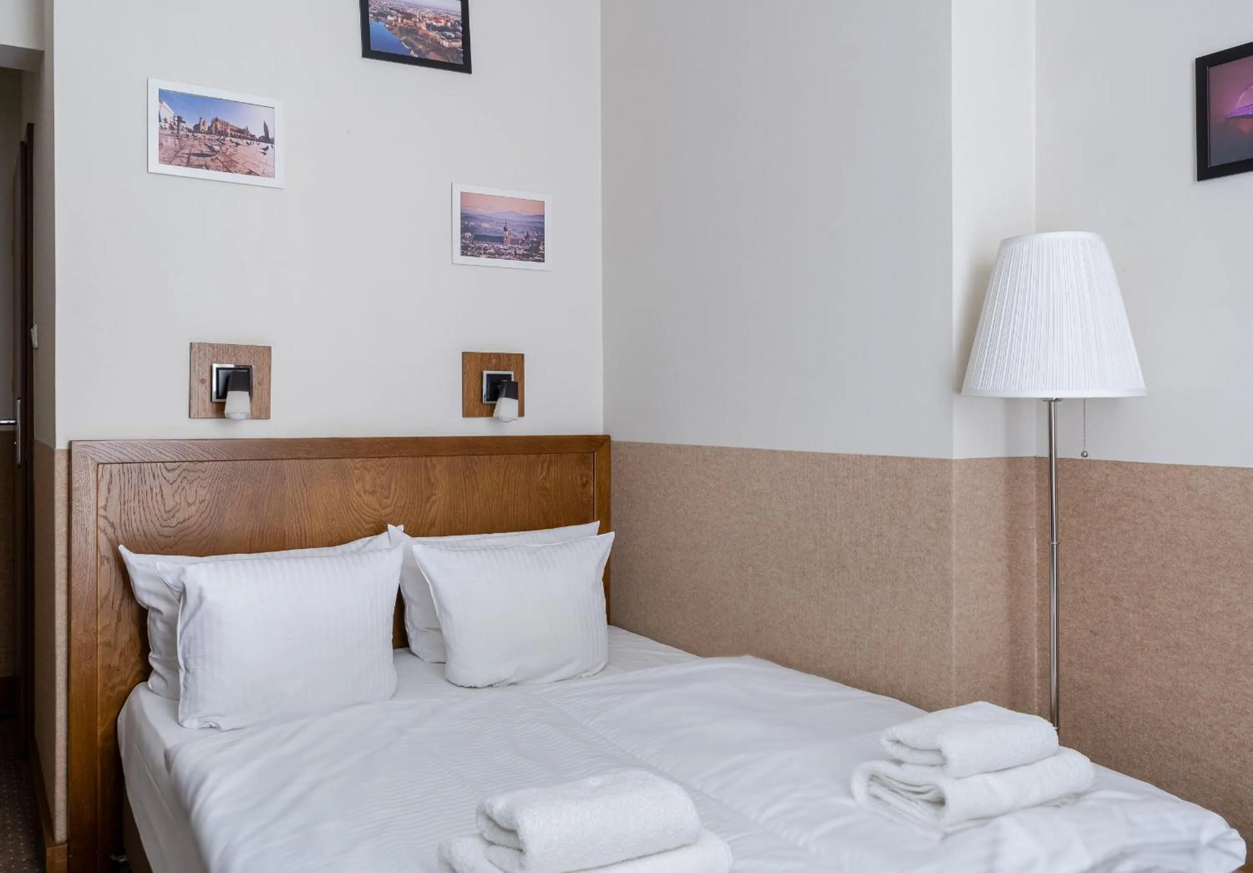 Bed in Daniel Griffin Aparthotel by Artery Hotels