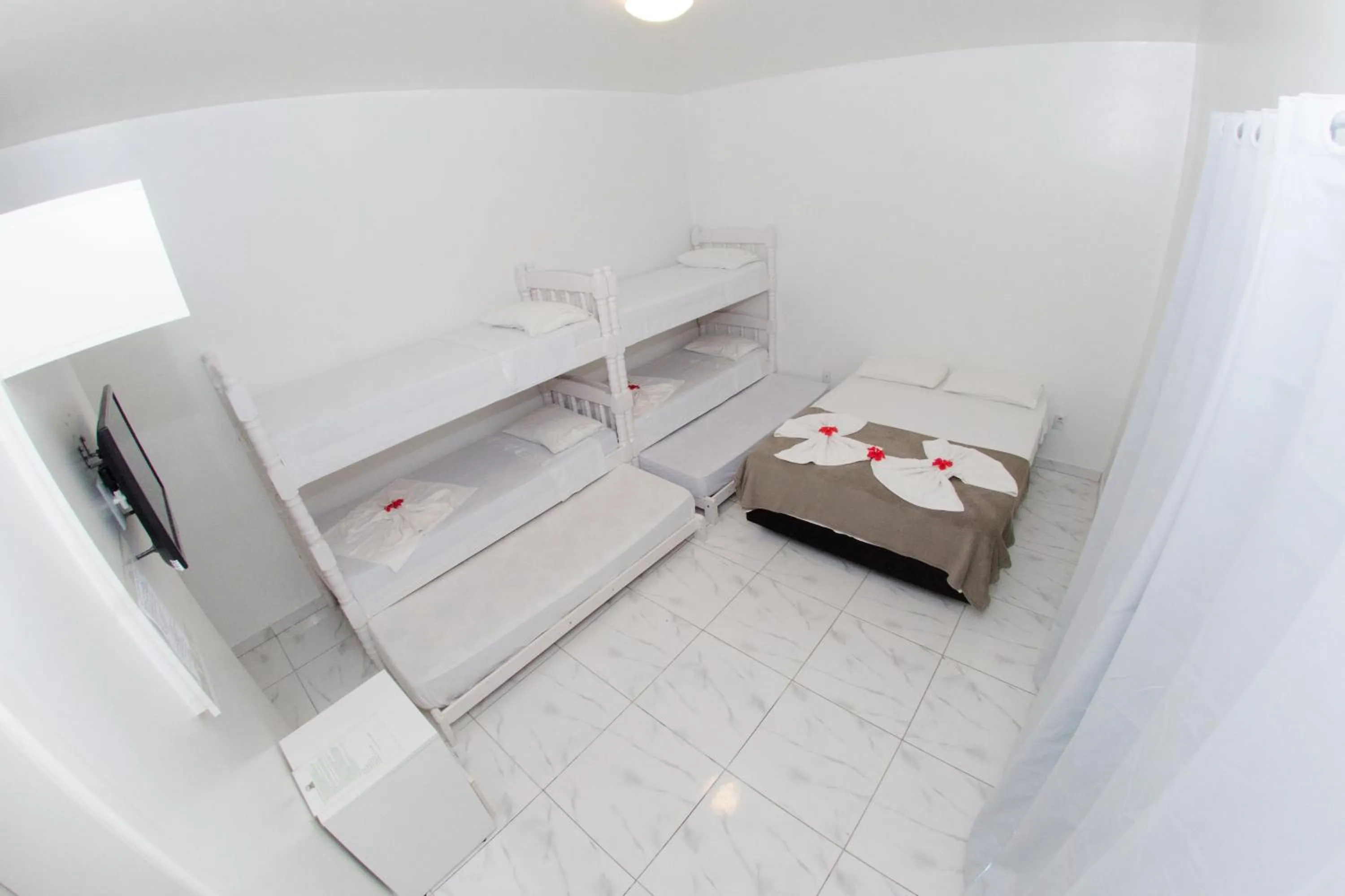 Bed in Pousada Nascer do Sol