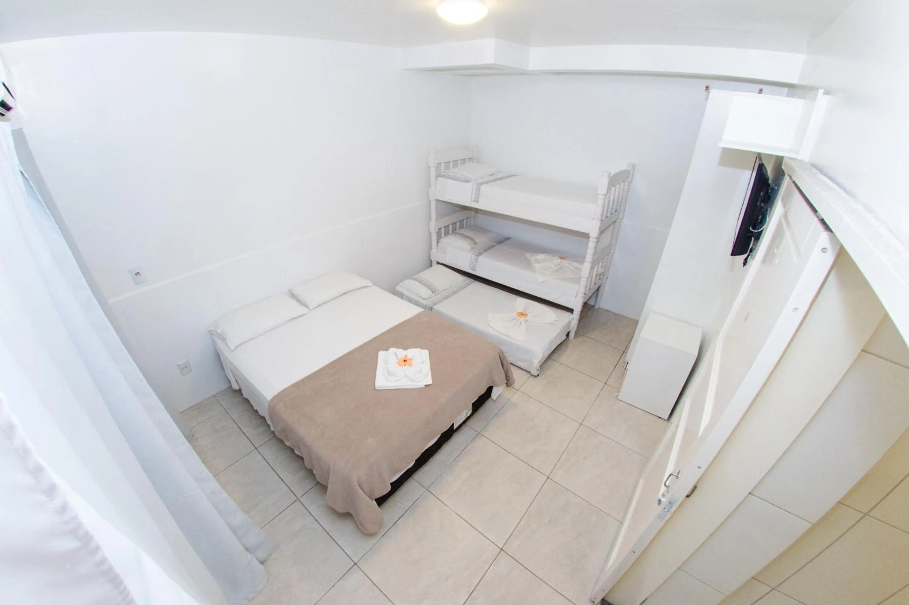 Bed in Pousada Nascer do Sol