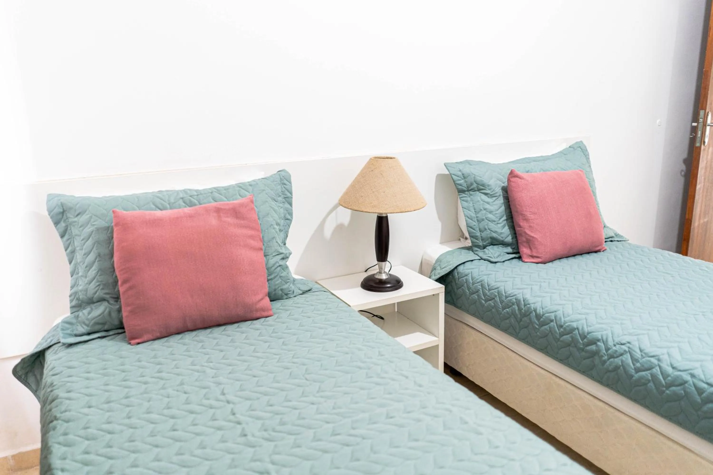 Bed in Bella Casa Flat Service