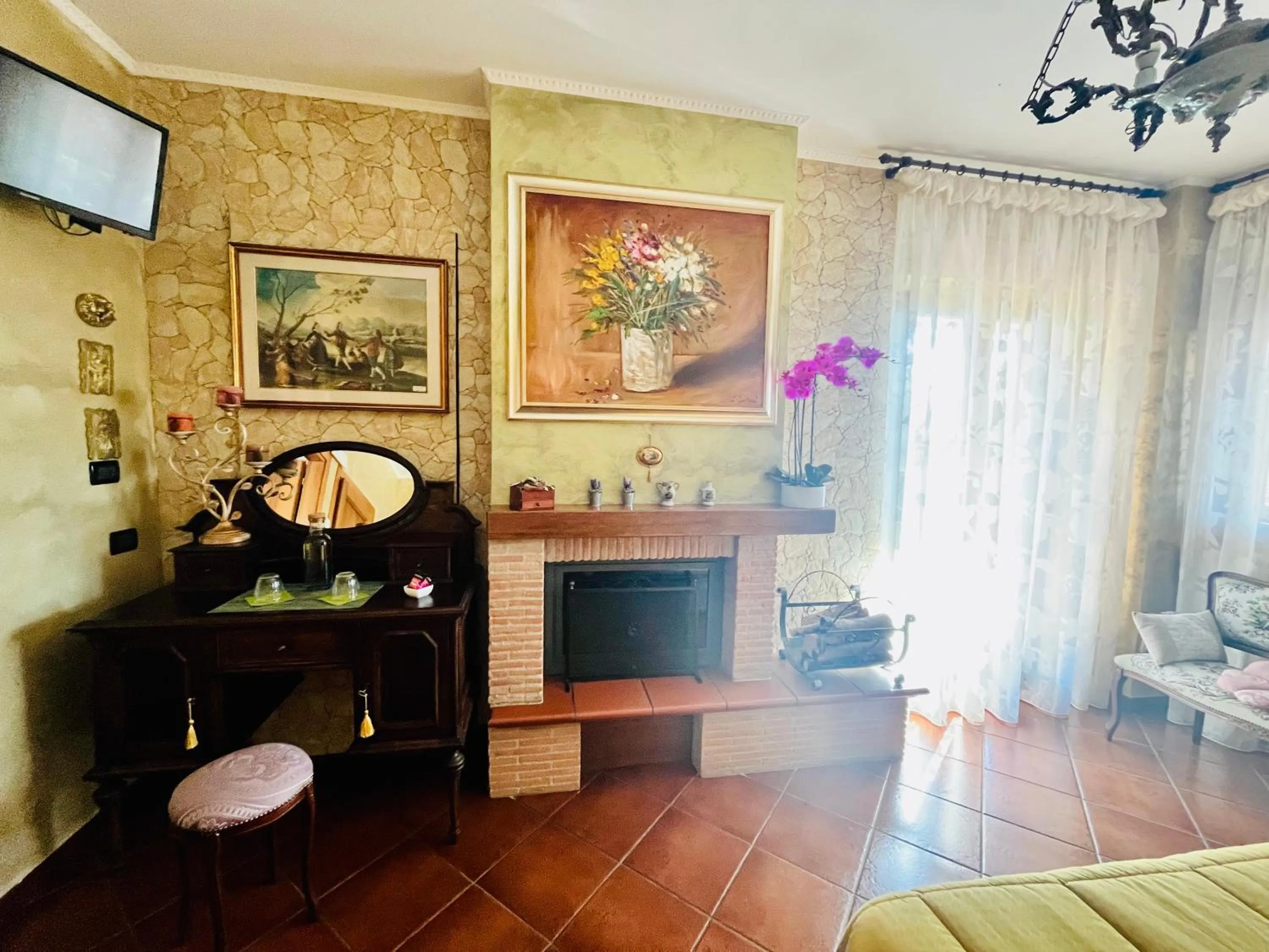 fireplace in La Mammola Bed&Breakfast