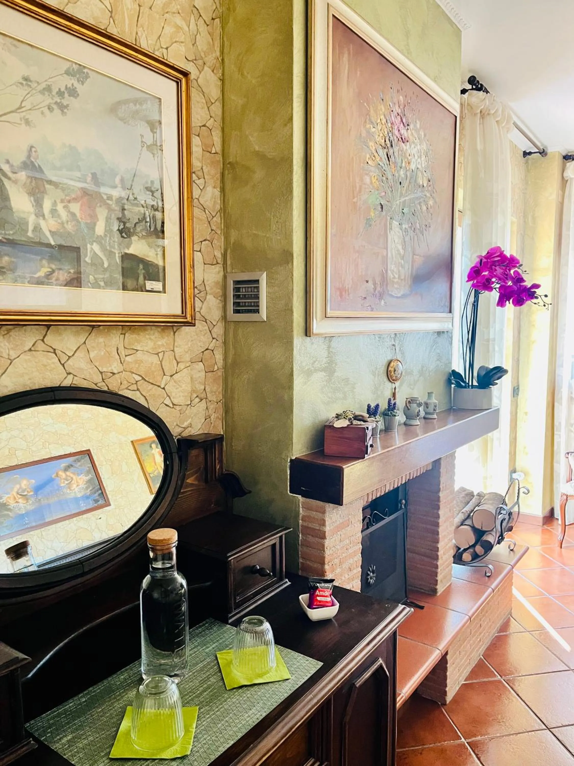 fireplace in La Mammola Bed&Breakfast