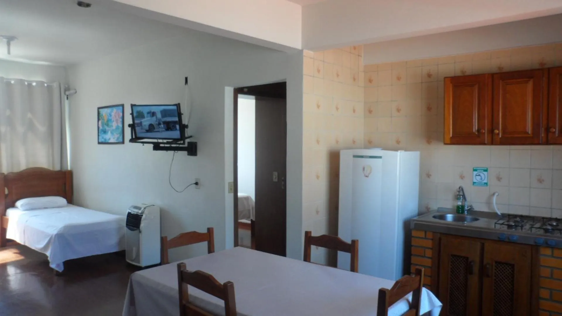 Communal lounge/ TV room in Apart Hotel La Cabana