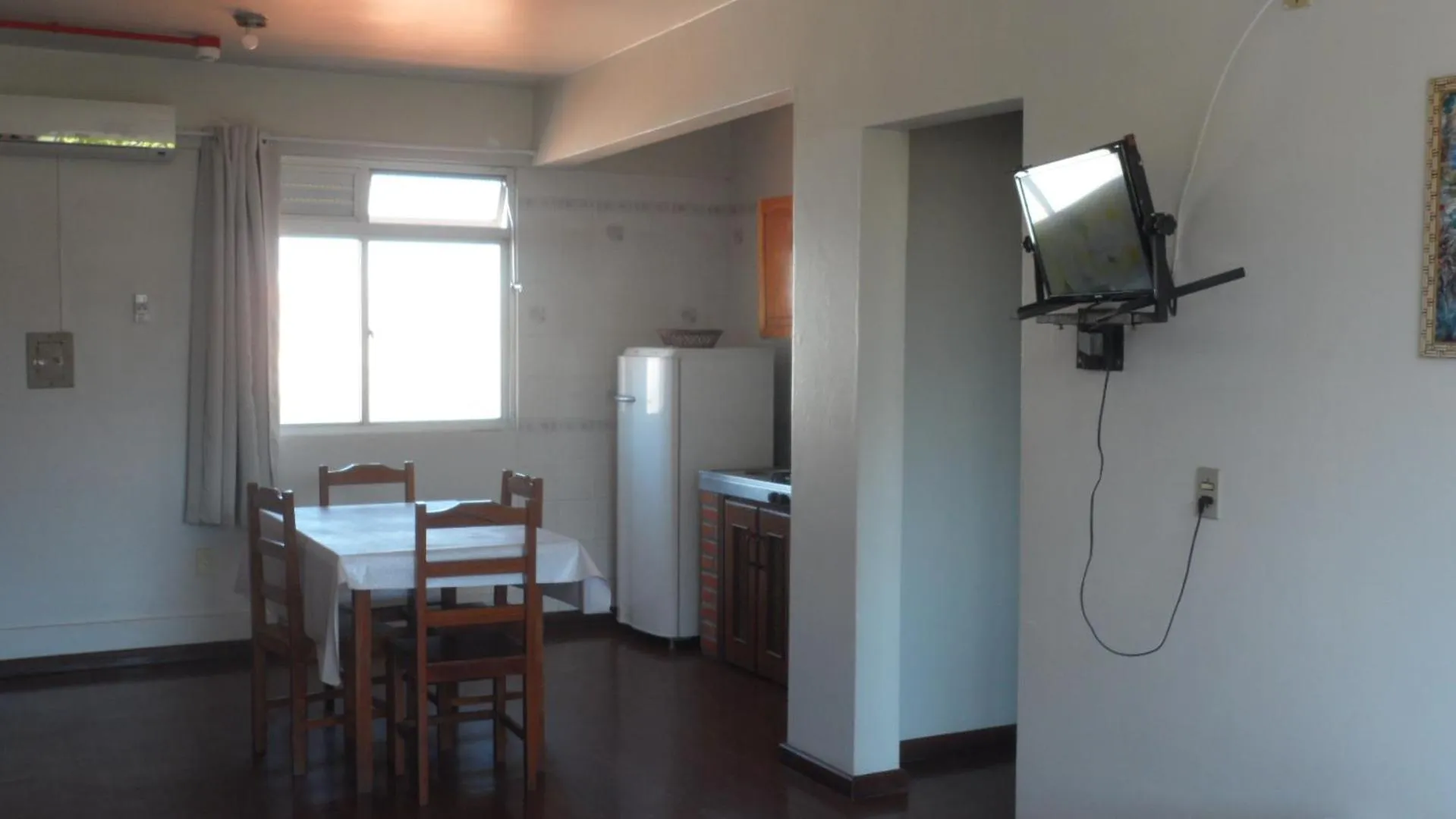 Communal lounge/ TV room in Apart Hotel La Cabana