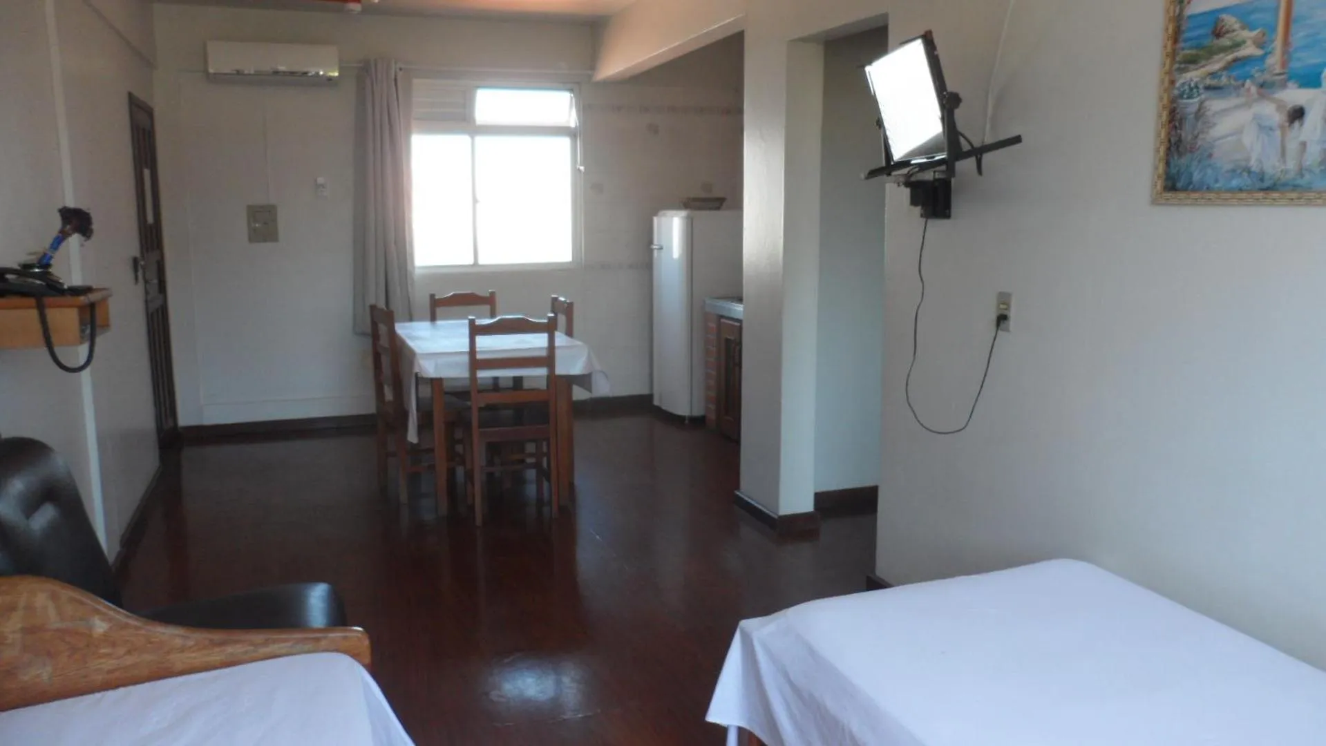 Communal lounge/ TV room, Bed in Apart Hotel La Cabana