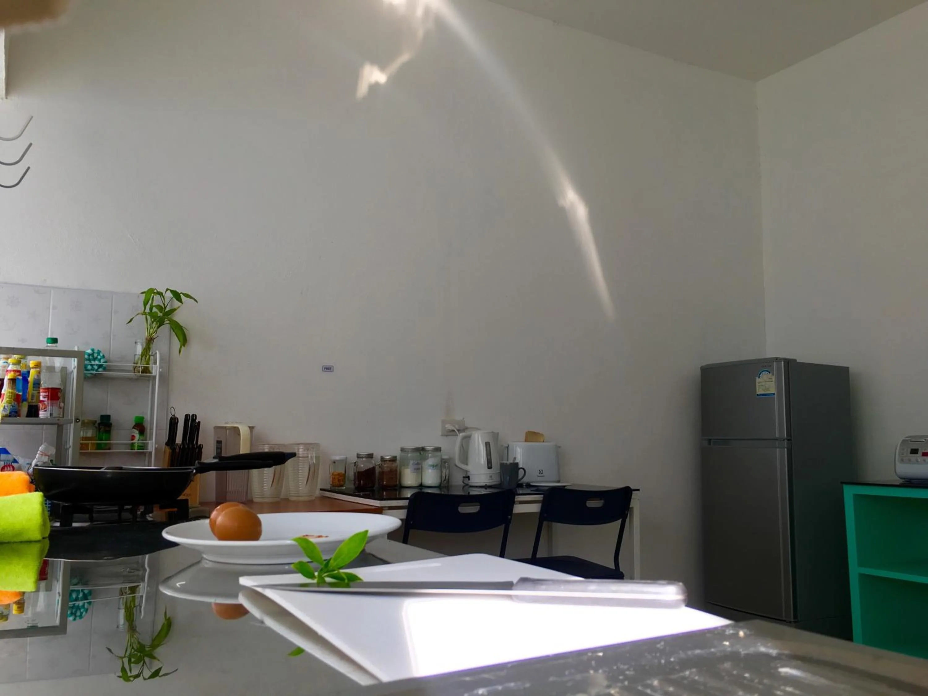 Communal kitchen in Sense of Yanui