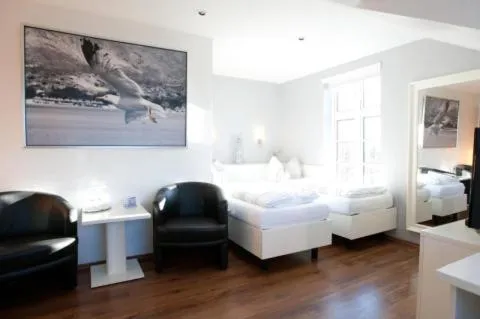 Seating area, Bed in Hotel Restaurant Friedrichs