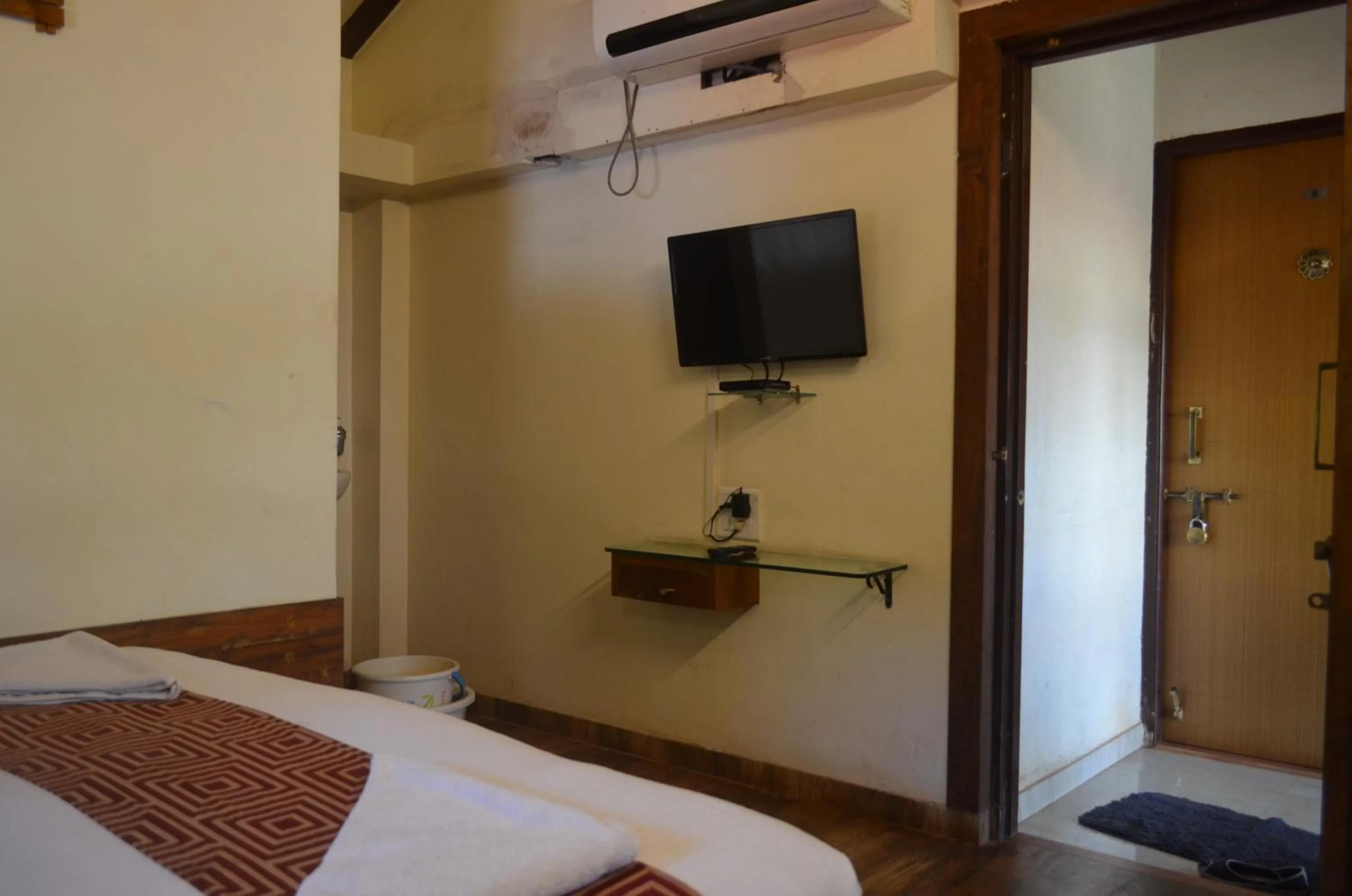 Bed in Kaular Atithis Grand Kokan Resort