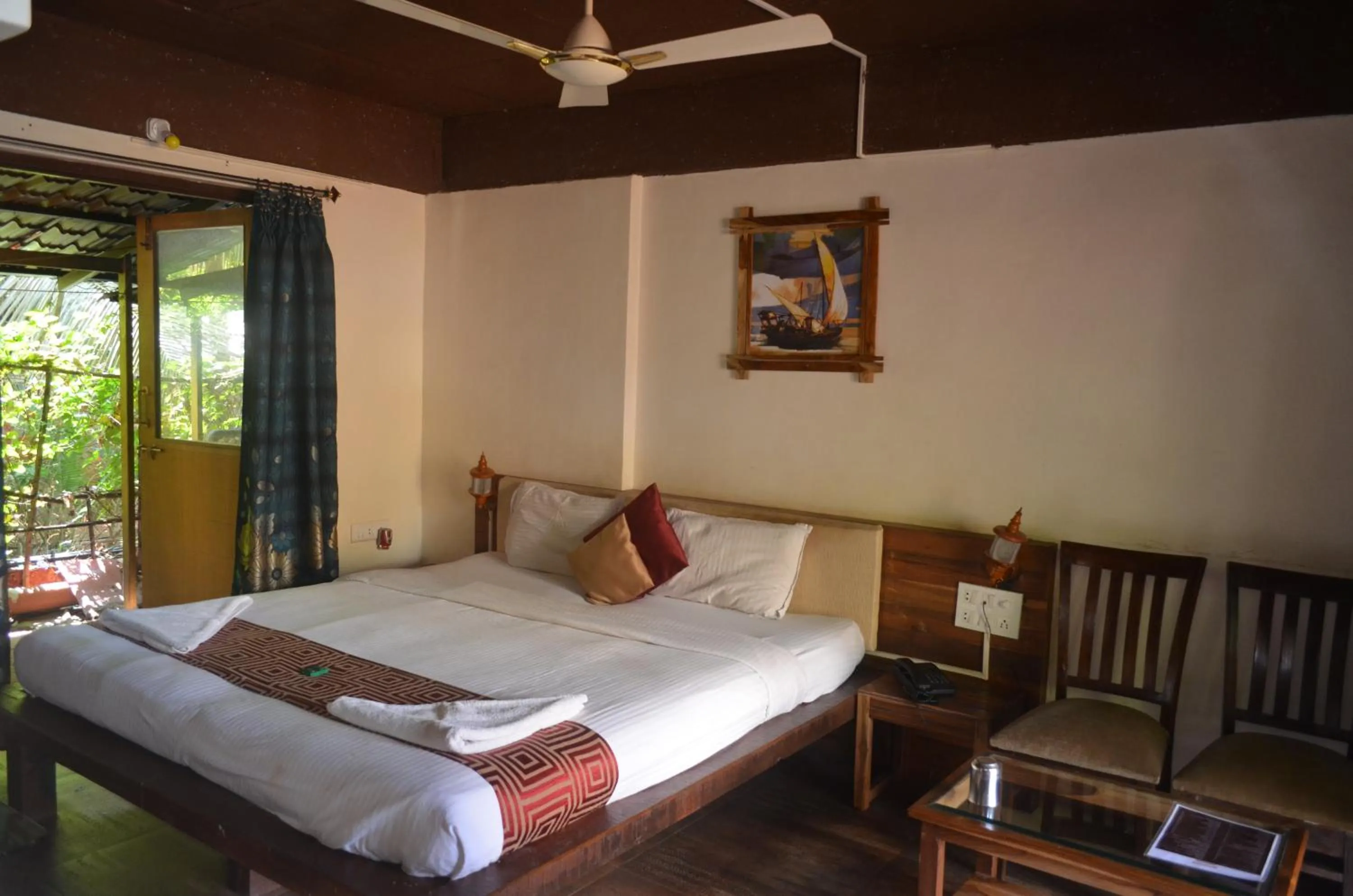 Bed in Kaular Atithis Grand Kokan Resort