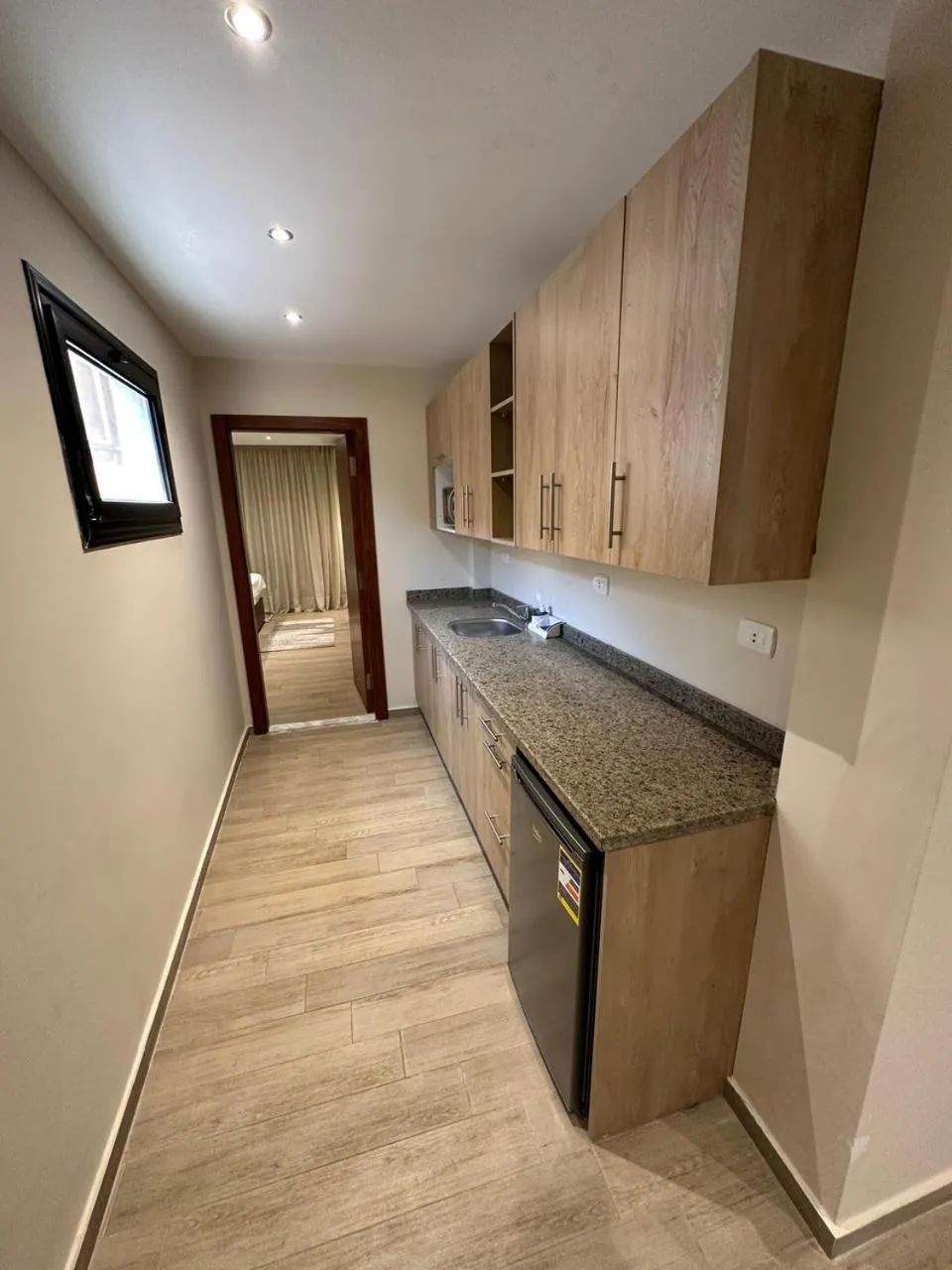 Kitchen or kitchenette in Nakhil Inn Residence